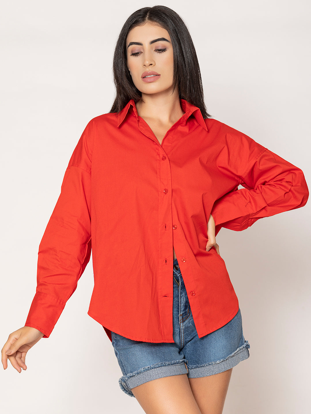 Close-up of spread collar and button-down front on red poplin shirt