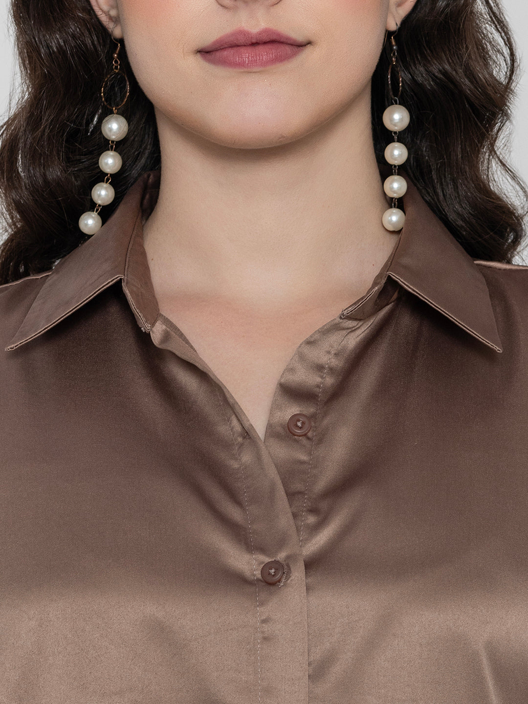 Side view of beige satin shirt