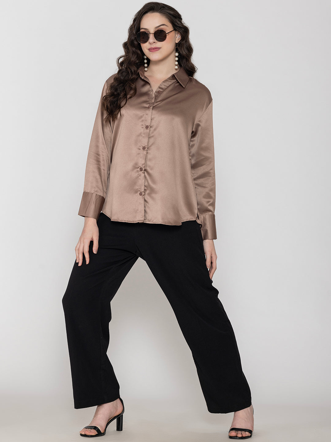 Detail of beige satin sleeve cuff