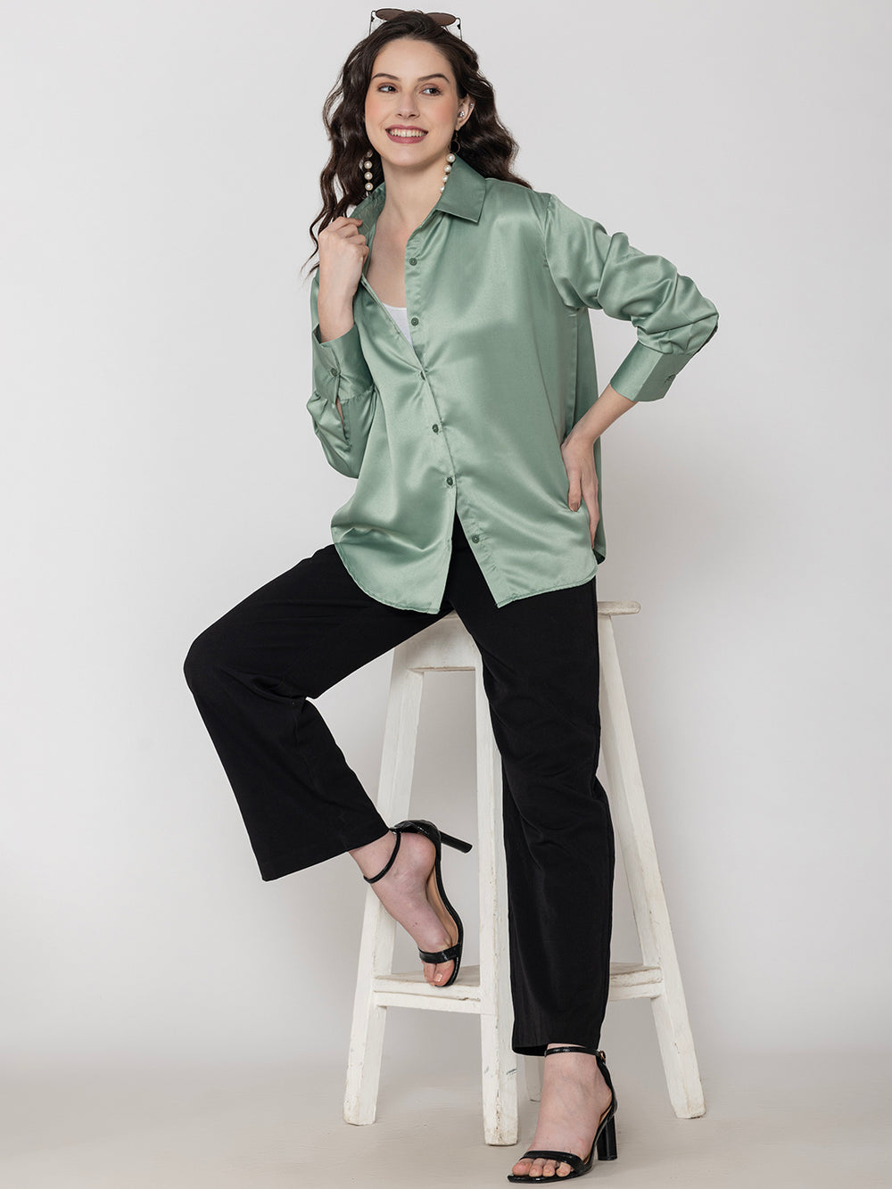 Front view of light green satin shirt with spread collar