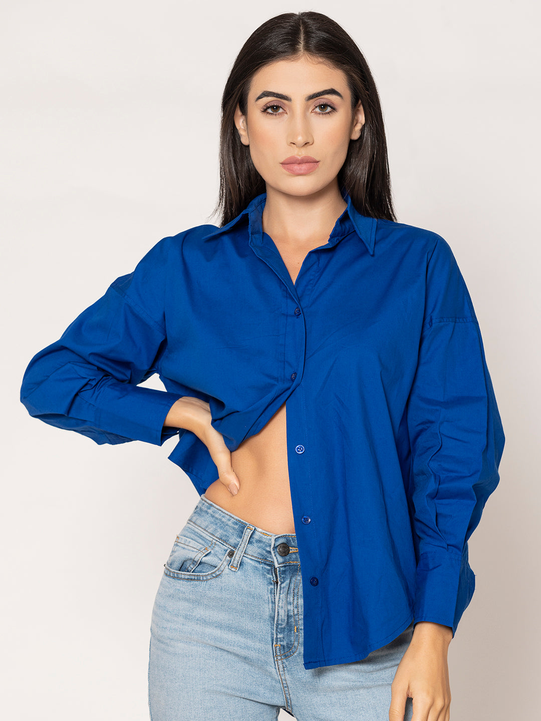 Curved hem on royal blue poplin shirt