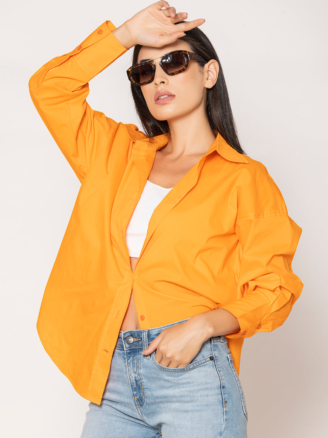 Front view of orange cotton poplin oversized shirt for women