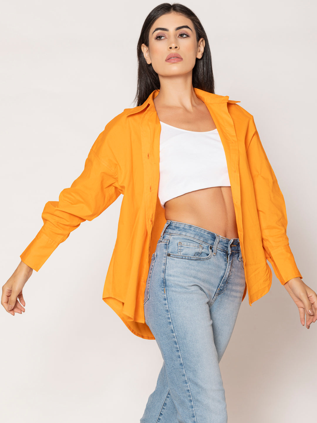 Side view of orange cotton poplin shirt