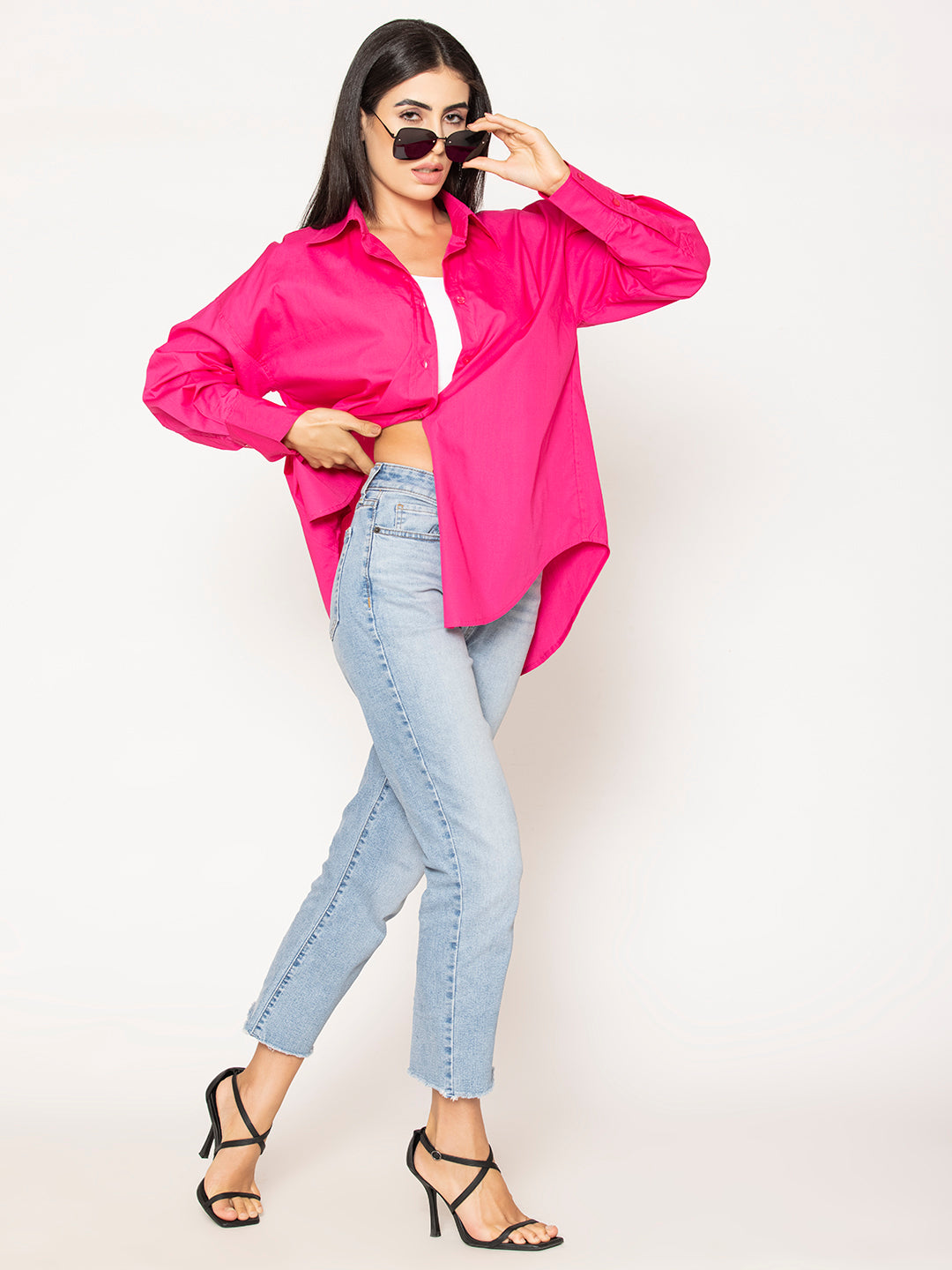 Curved hem detail on hot pink poplin shirt