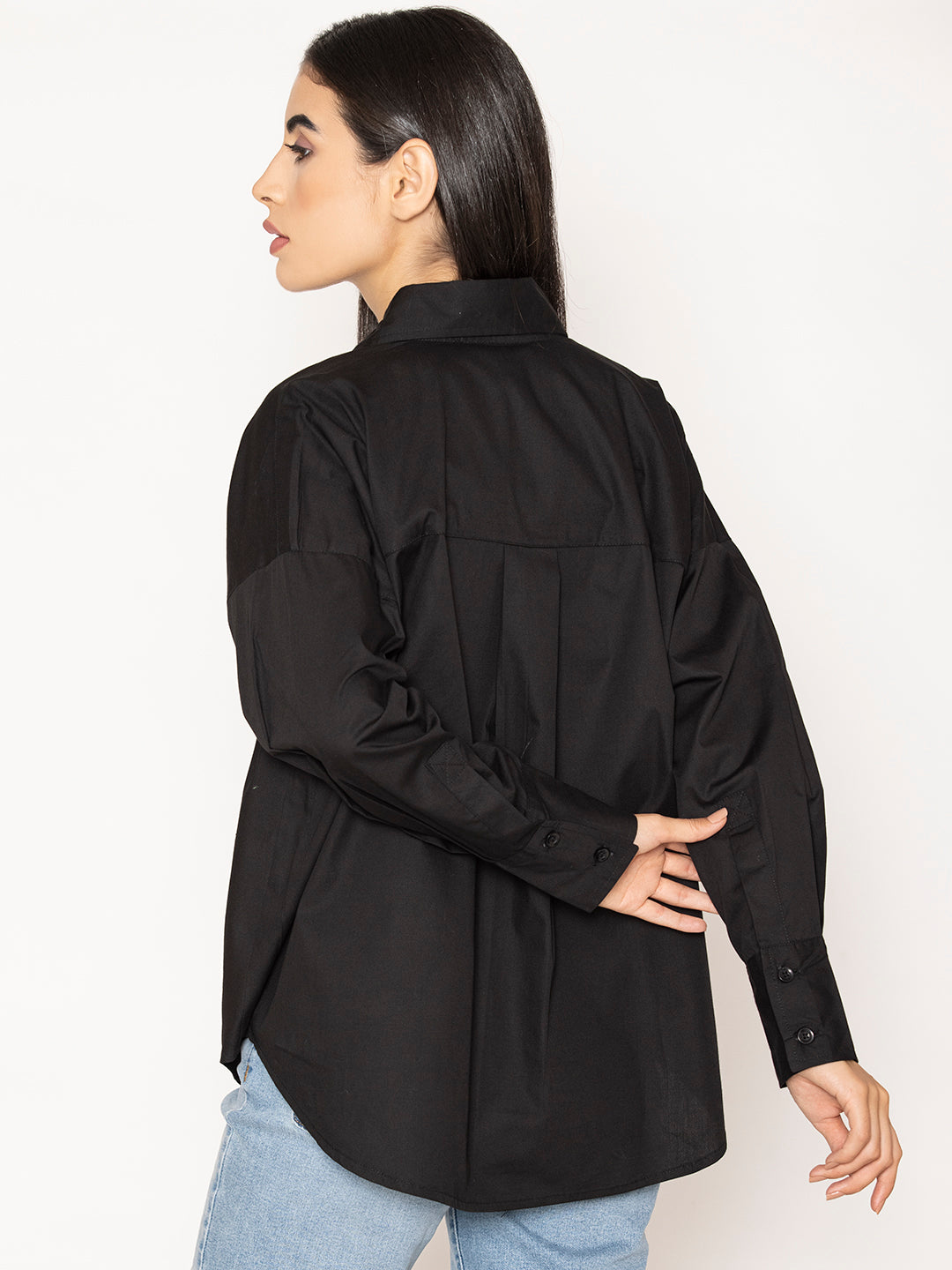 Close-up of spread collar and button-down front on black poplin shirt
