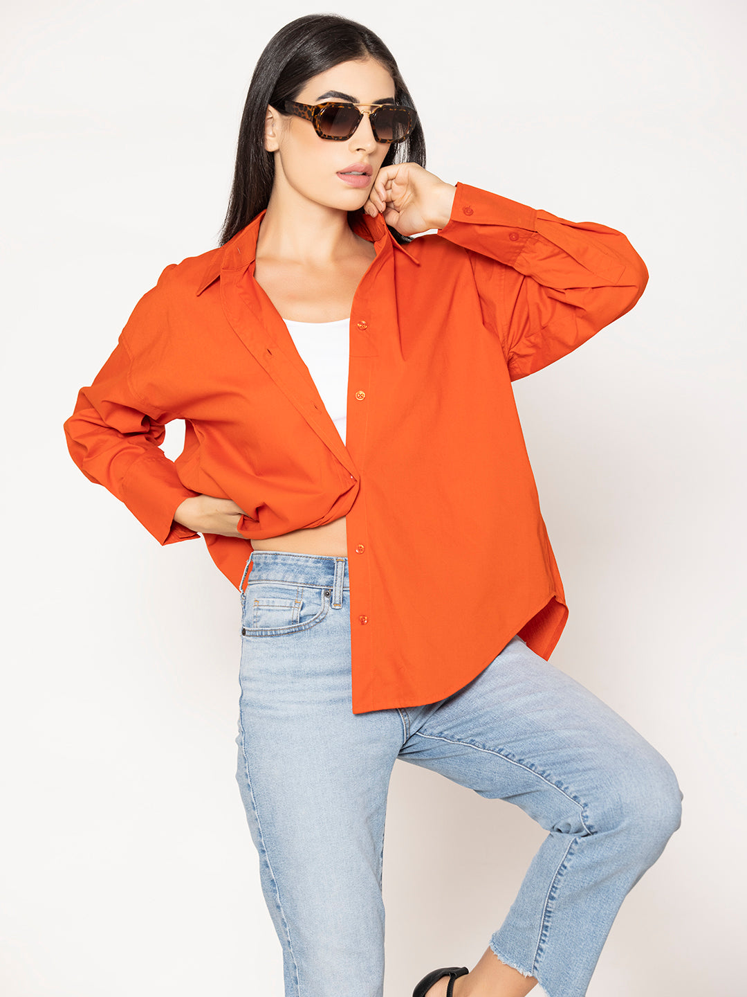 Front view of rust cotton poplin oversized shirt for women