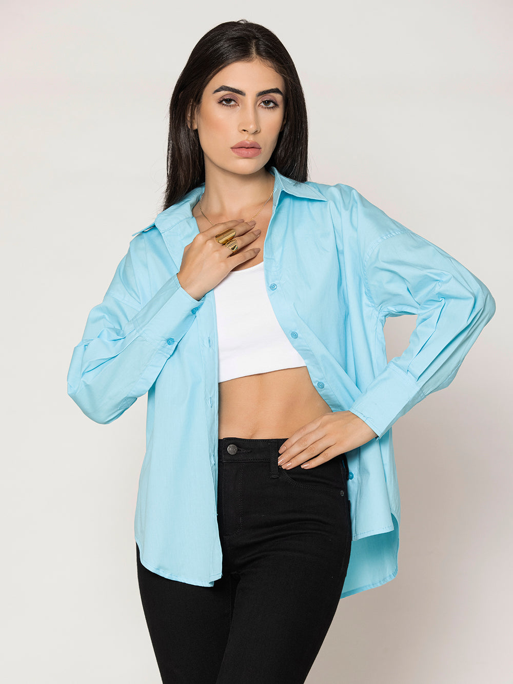 Side view of sky blue cotton poplin shirt