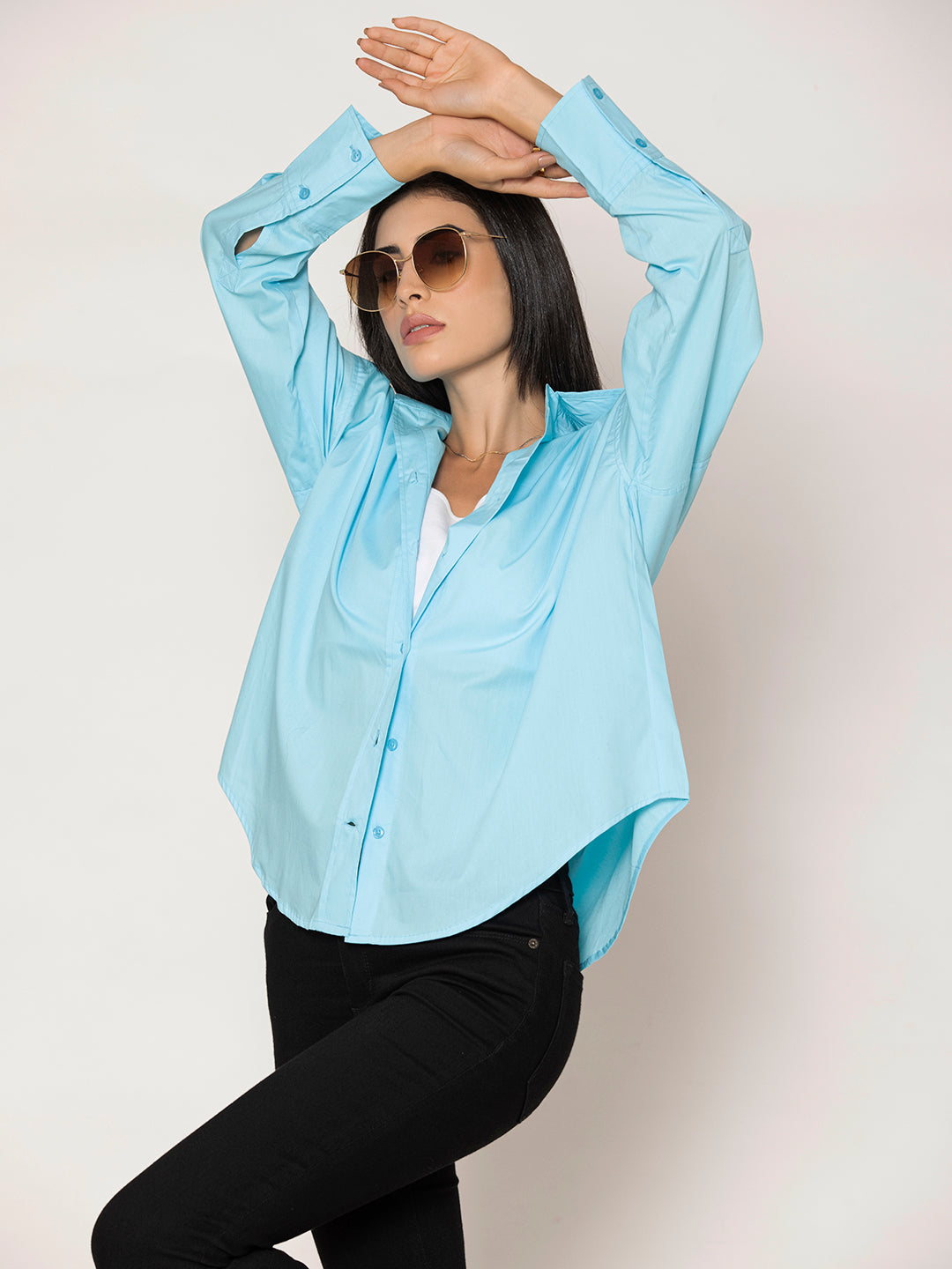 Front view of sky blue cotton poplin oversized shirt for women