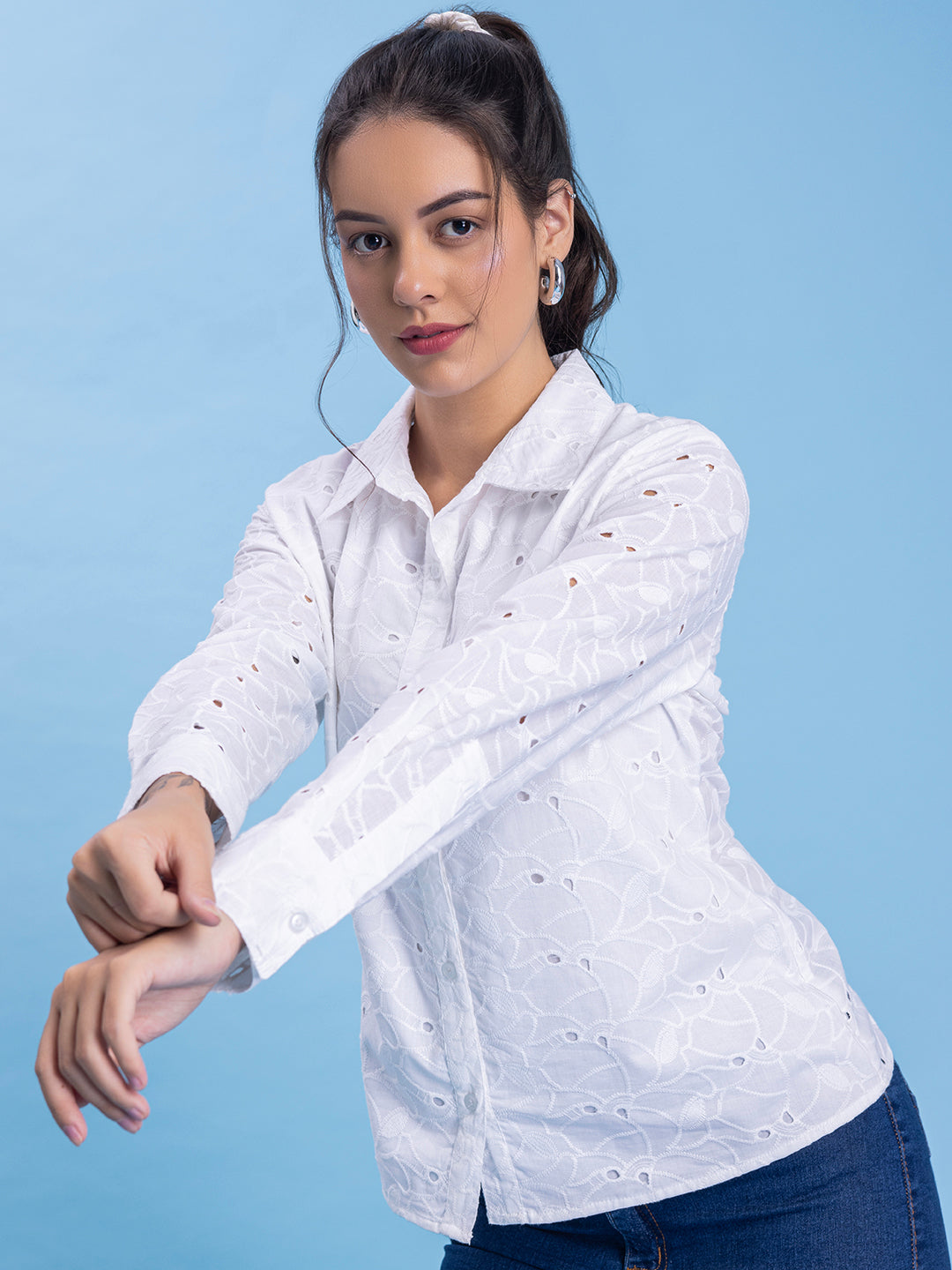 Detail of cotton fabric on white shirt