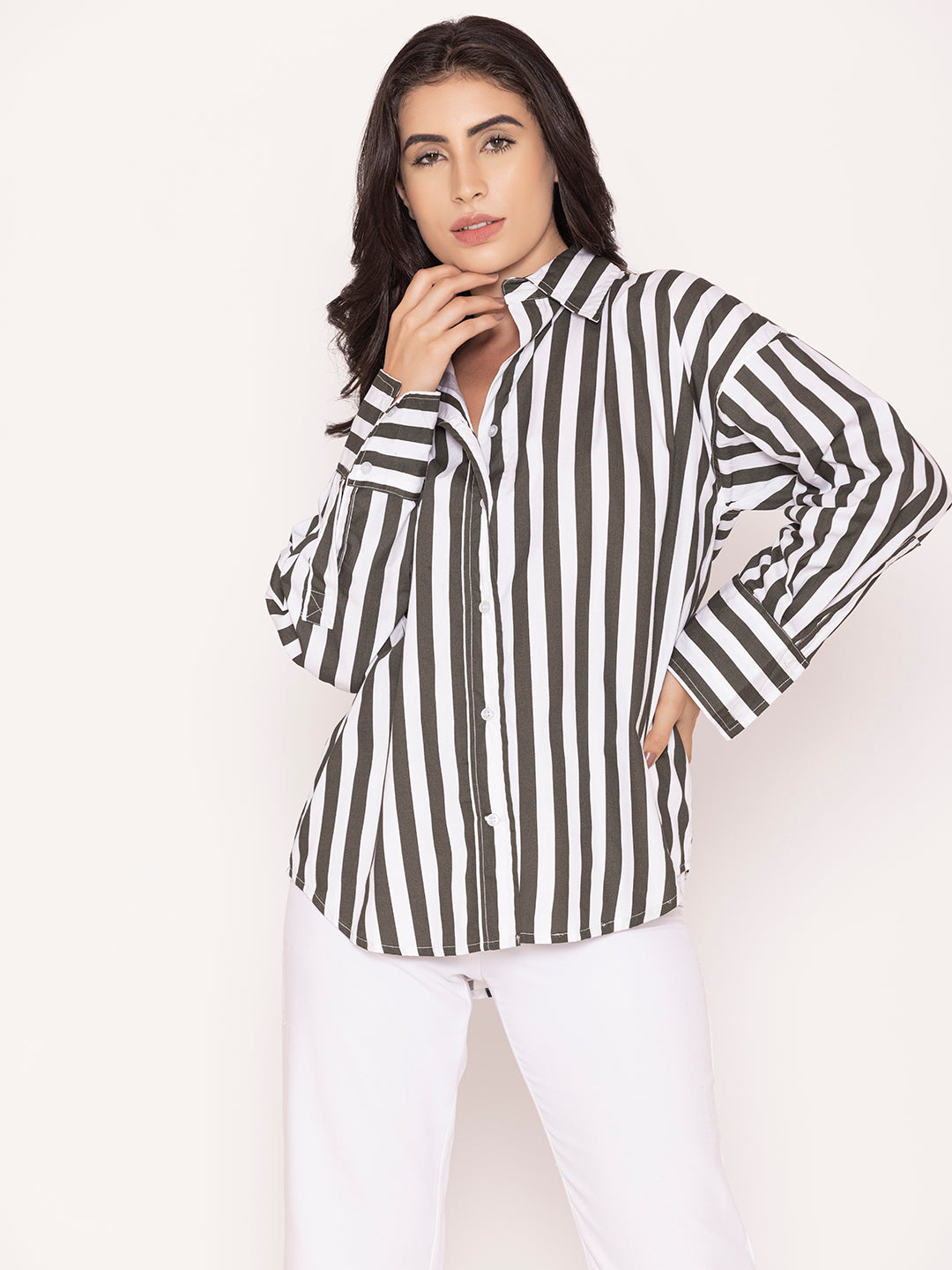 Buttoned cuff detail on black striped shirt