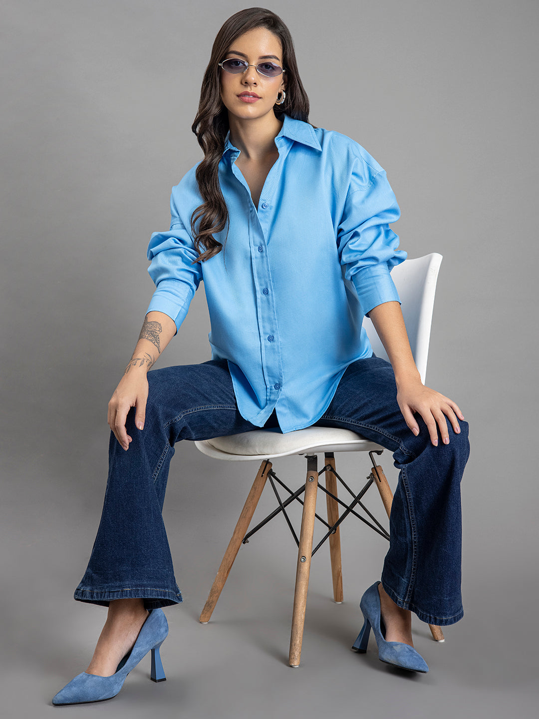 Front button placket of sky blue twill shirt