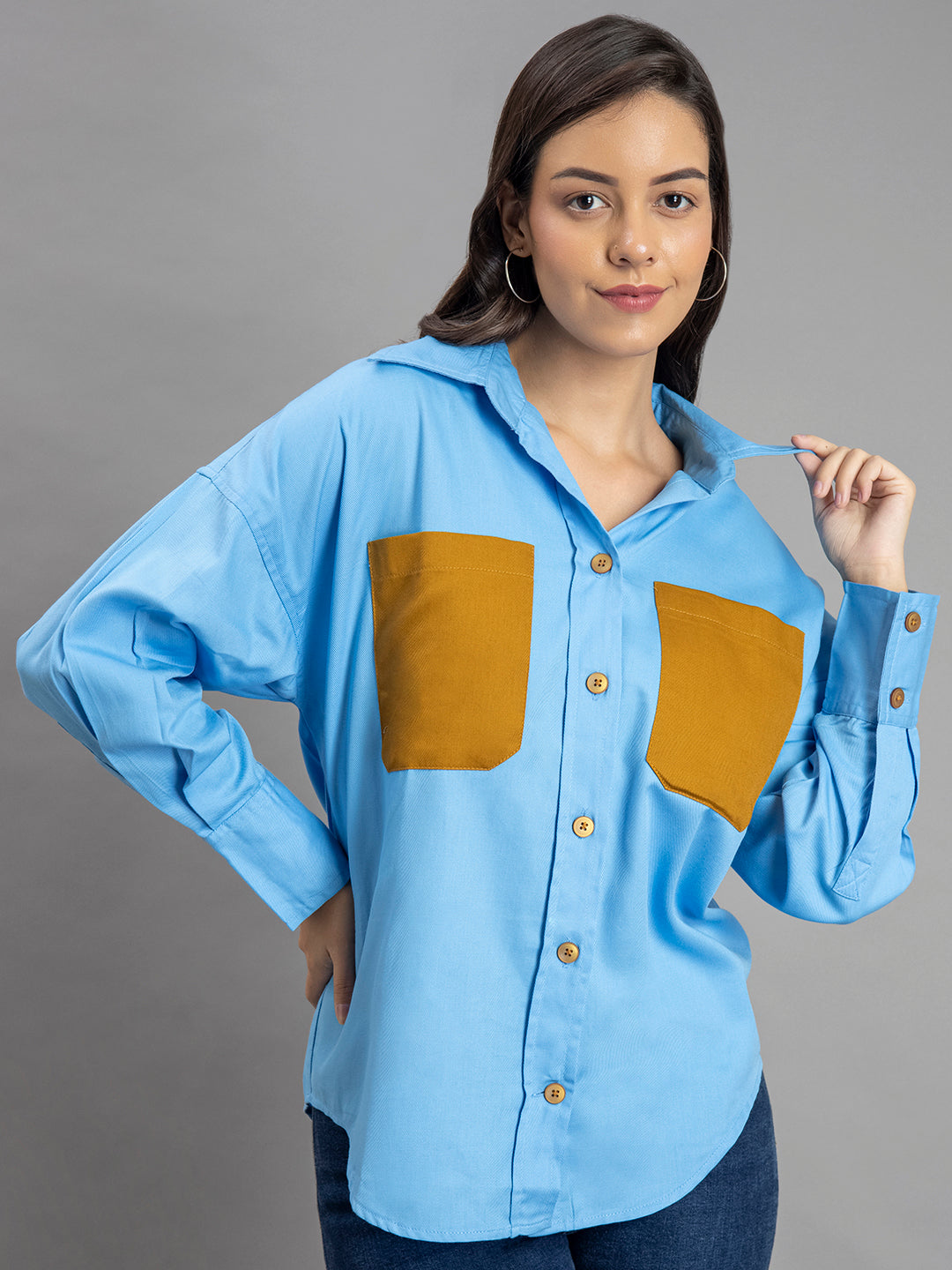 Lifestyle shot of sky blue twill cotton shirt