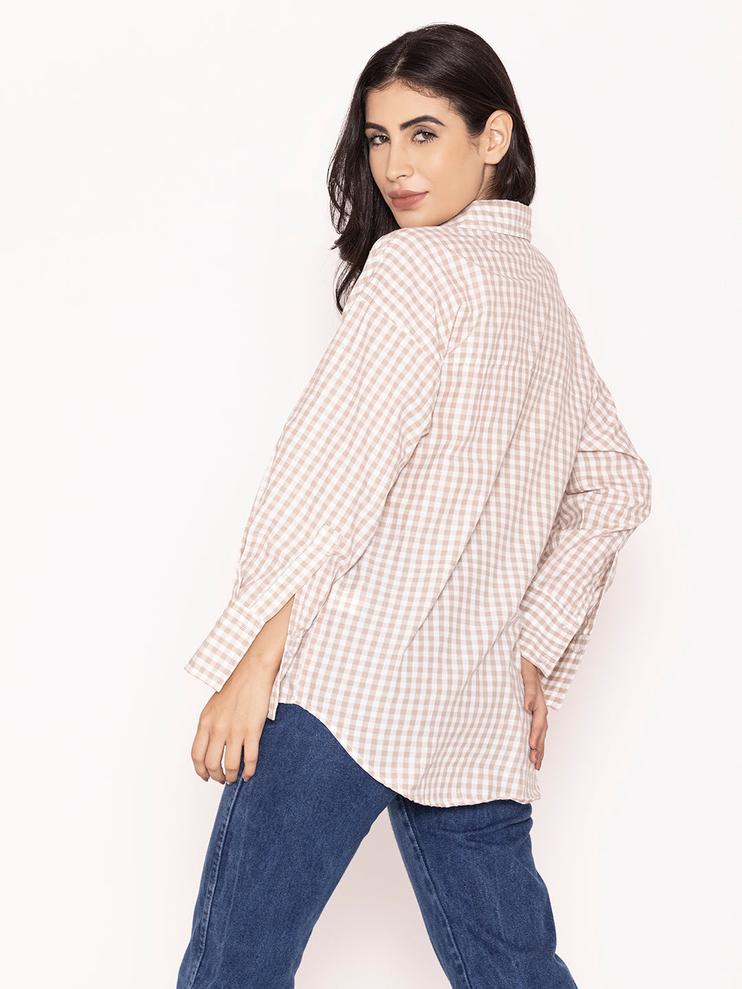 Buttoned cuff detail on khaki cotton shirt