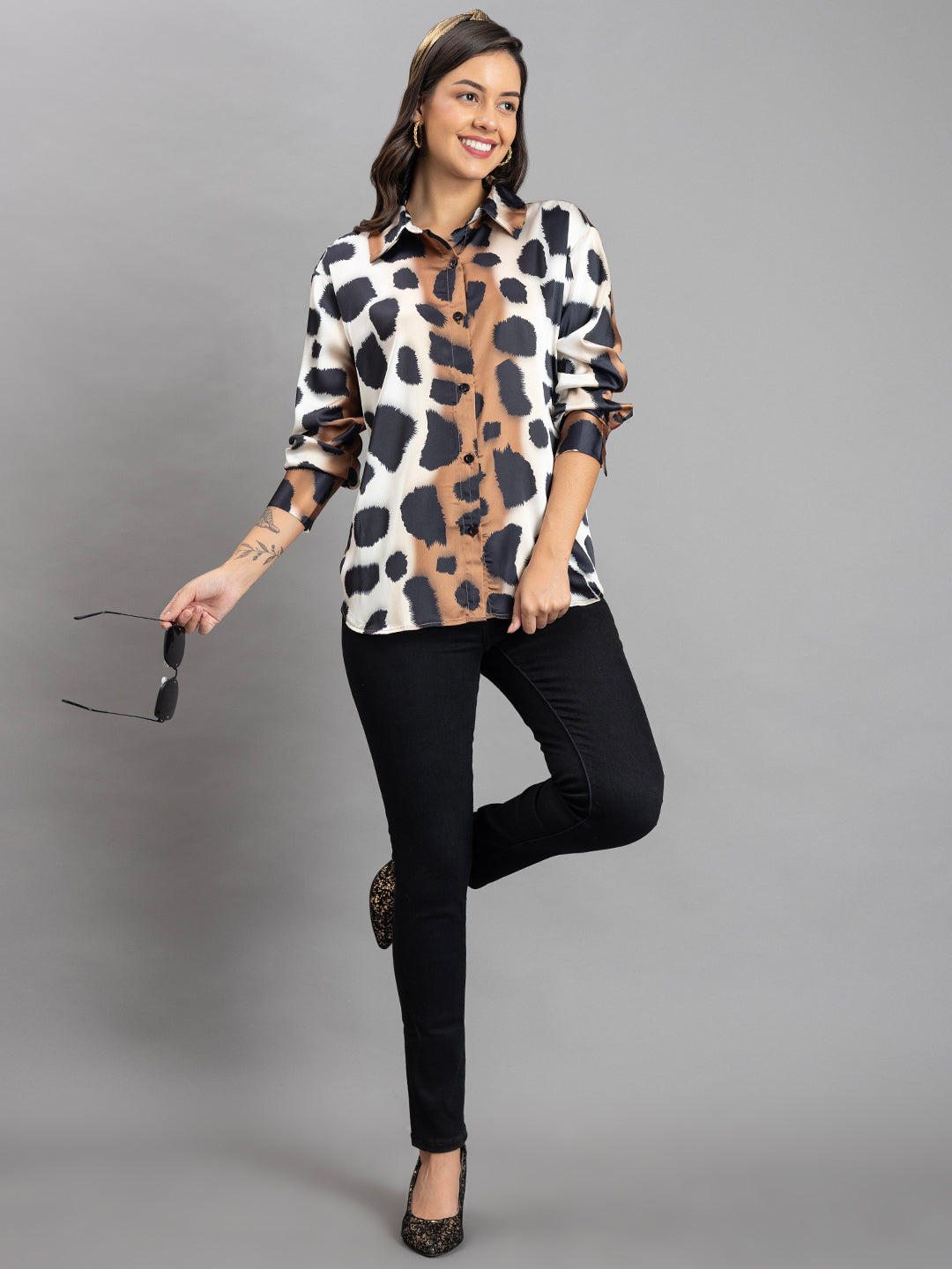 Animal print satin shirt detail of placket