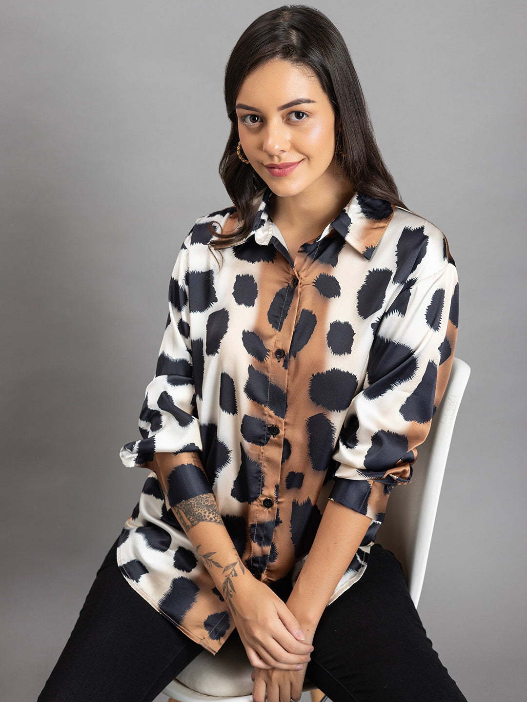 Animal print satin shirt styled with trousers