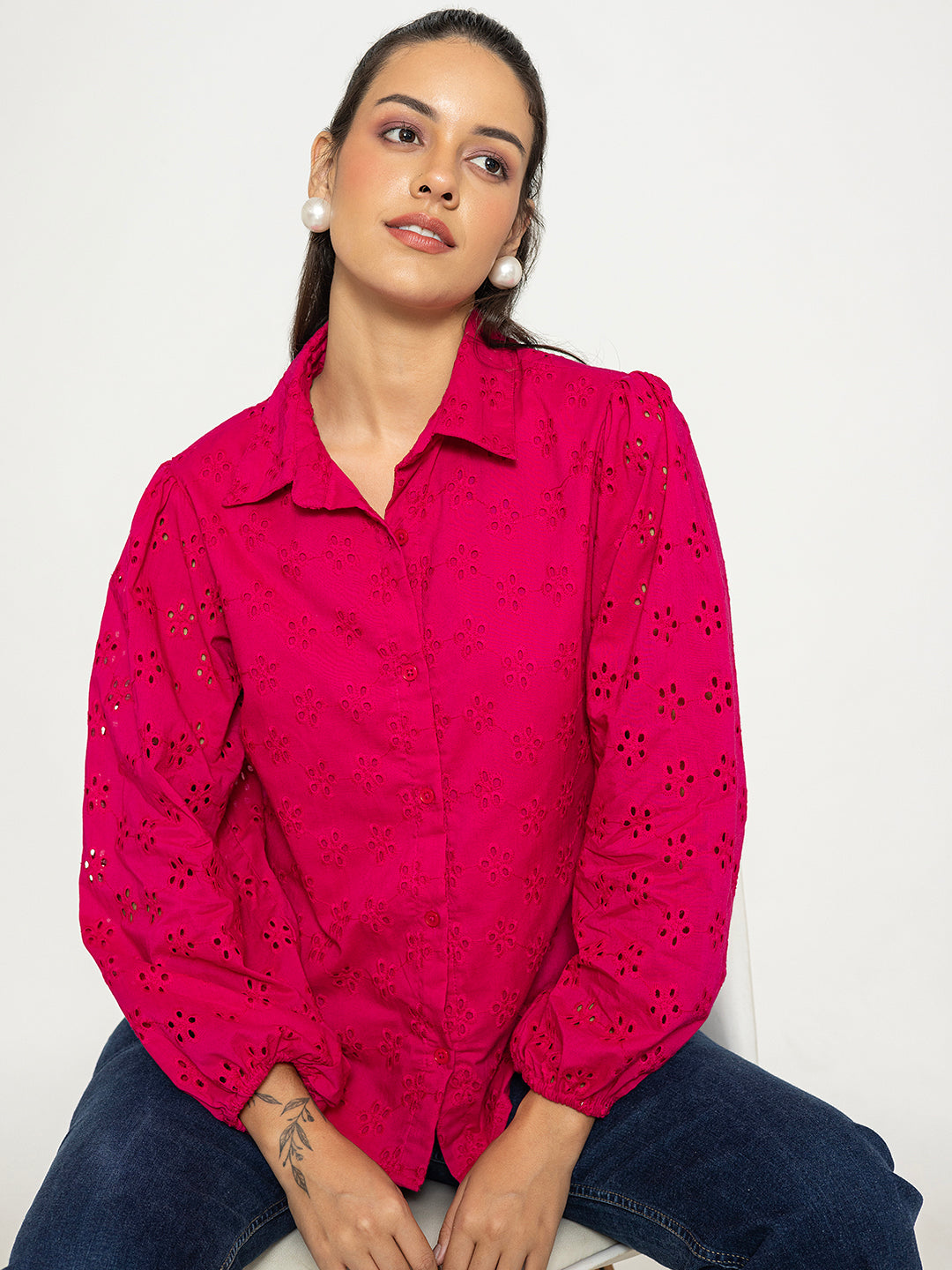 Hem detail on hot pink Schiffli shirt