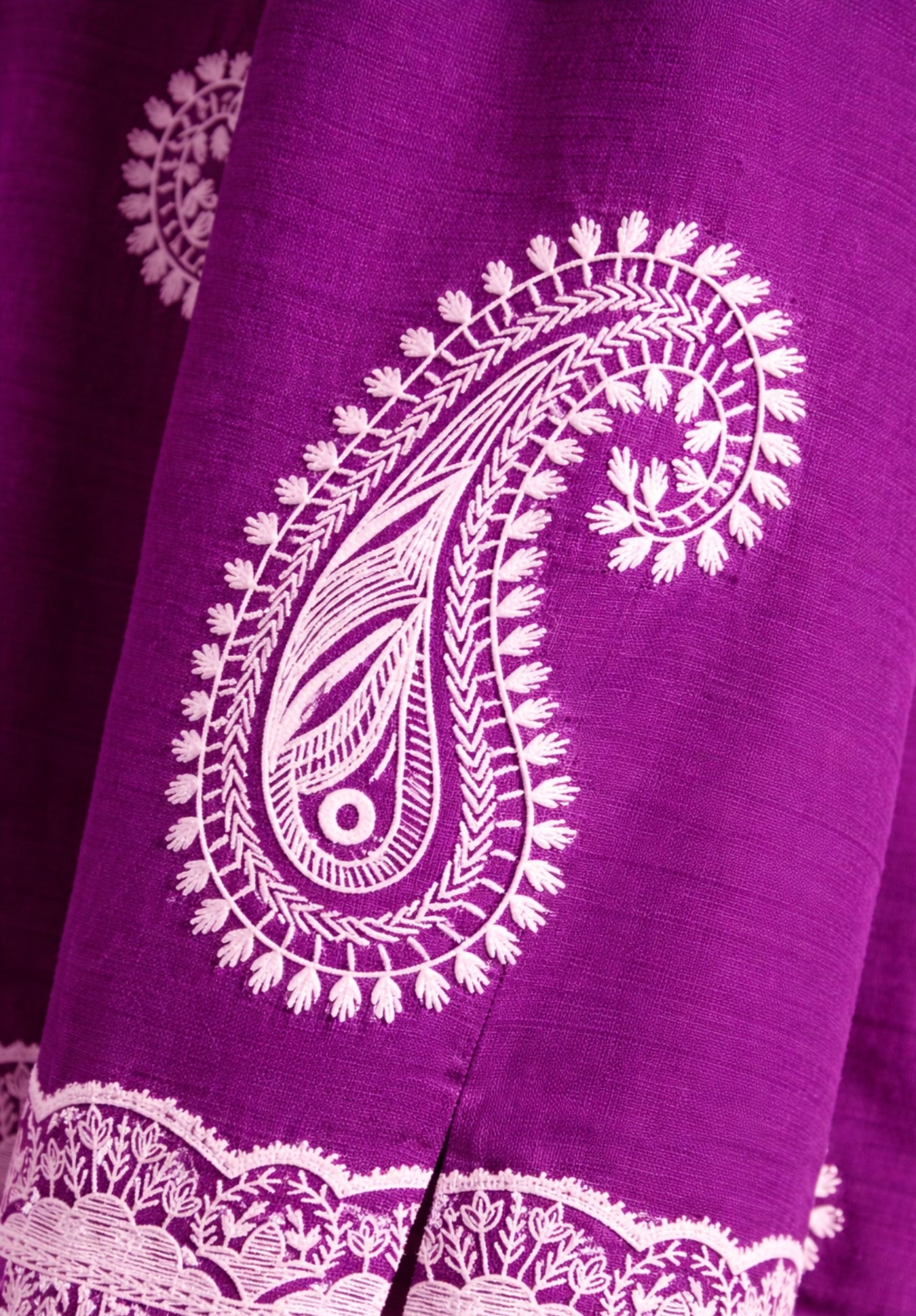 Lifestyle shot of woman wearing purple satin puff print oversized shirt