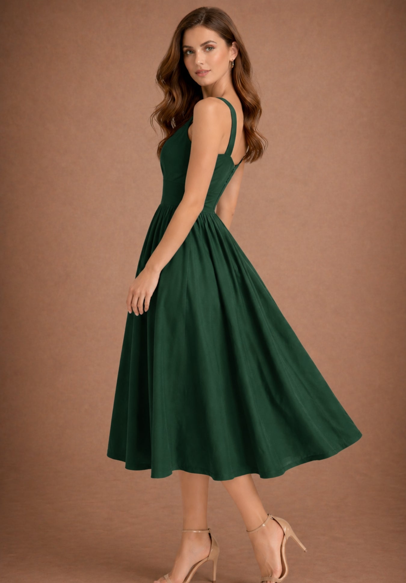 Lifestyle shot of olive cotton dress styled with accessories