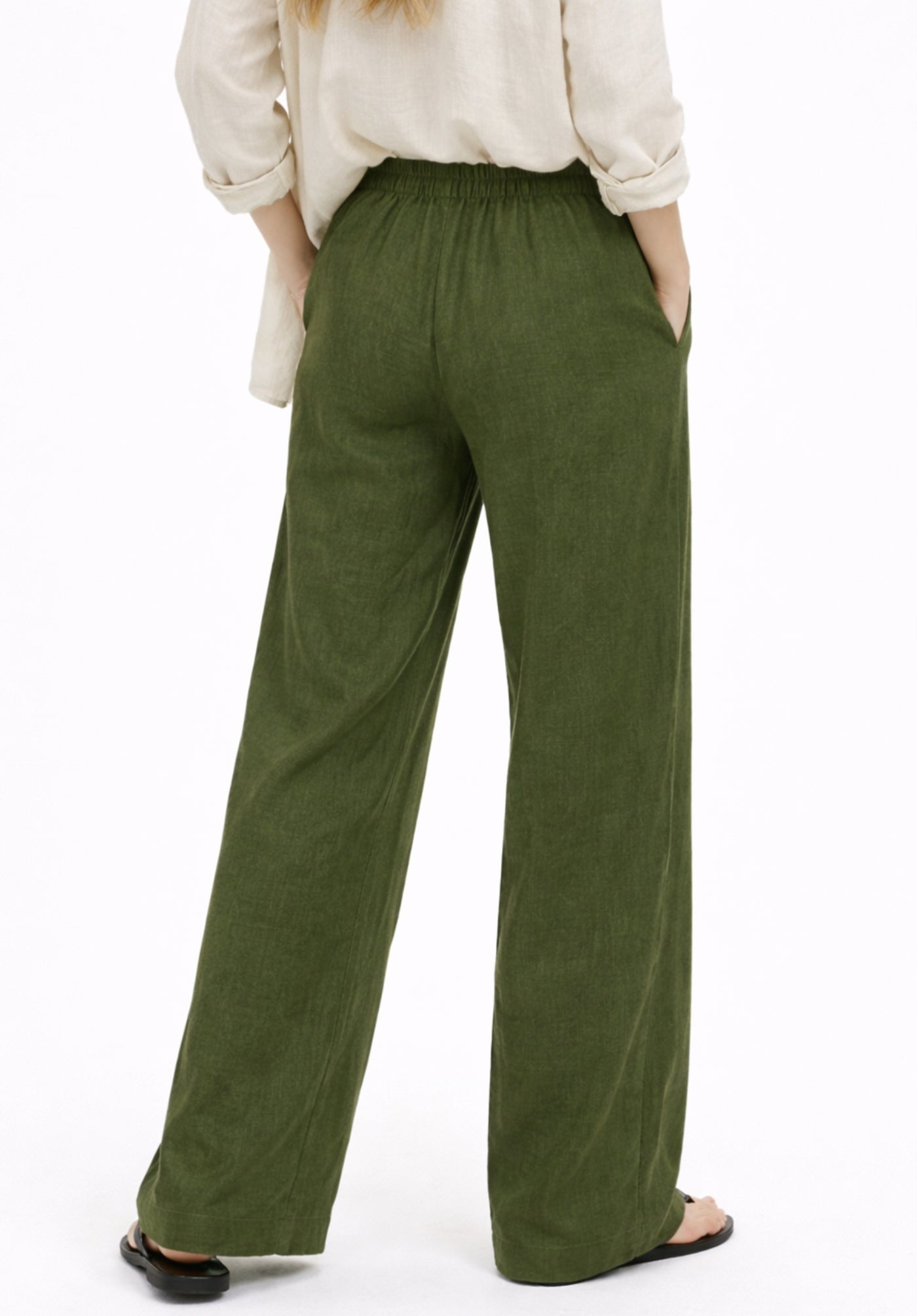 Olive baggy trousers styled with top — full outfit