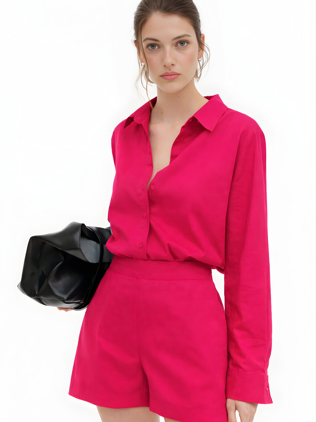 Front view of woman in hot pink poplin cotton shorts co-ord set