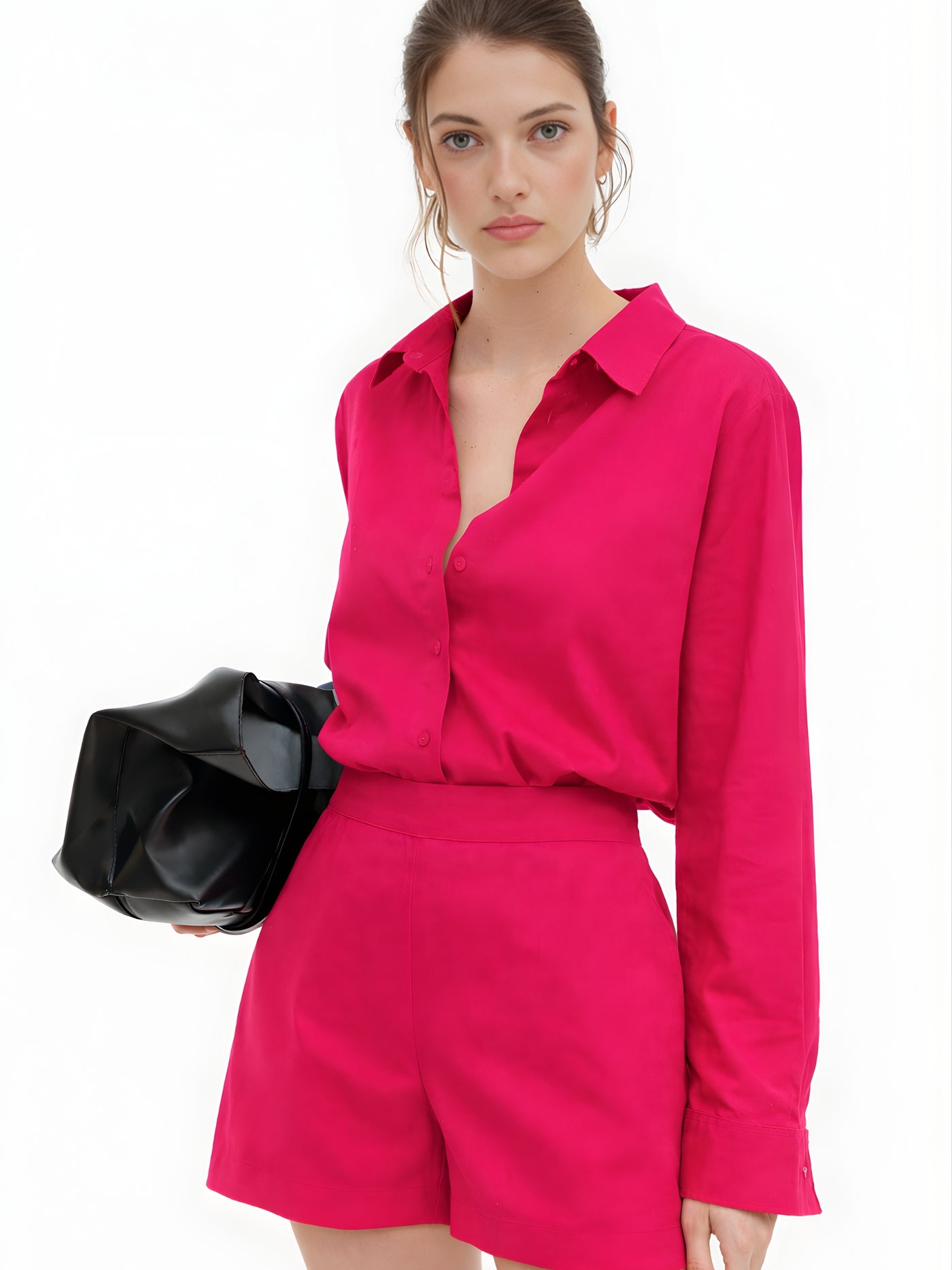 Front view of woman in hot pink poplin cotton shorts co-ord set