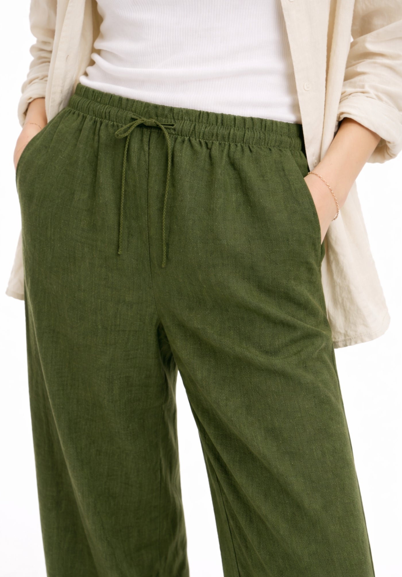 Olive linen-blend trousers fabric close-up