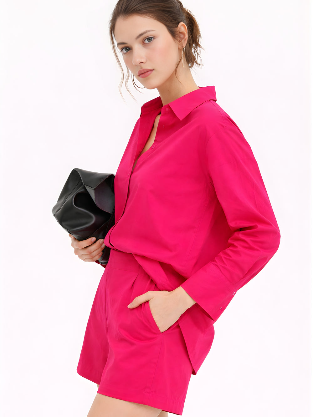 Side angle of hot pink poplin cotton co-ord on model