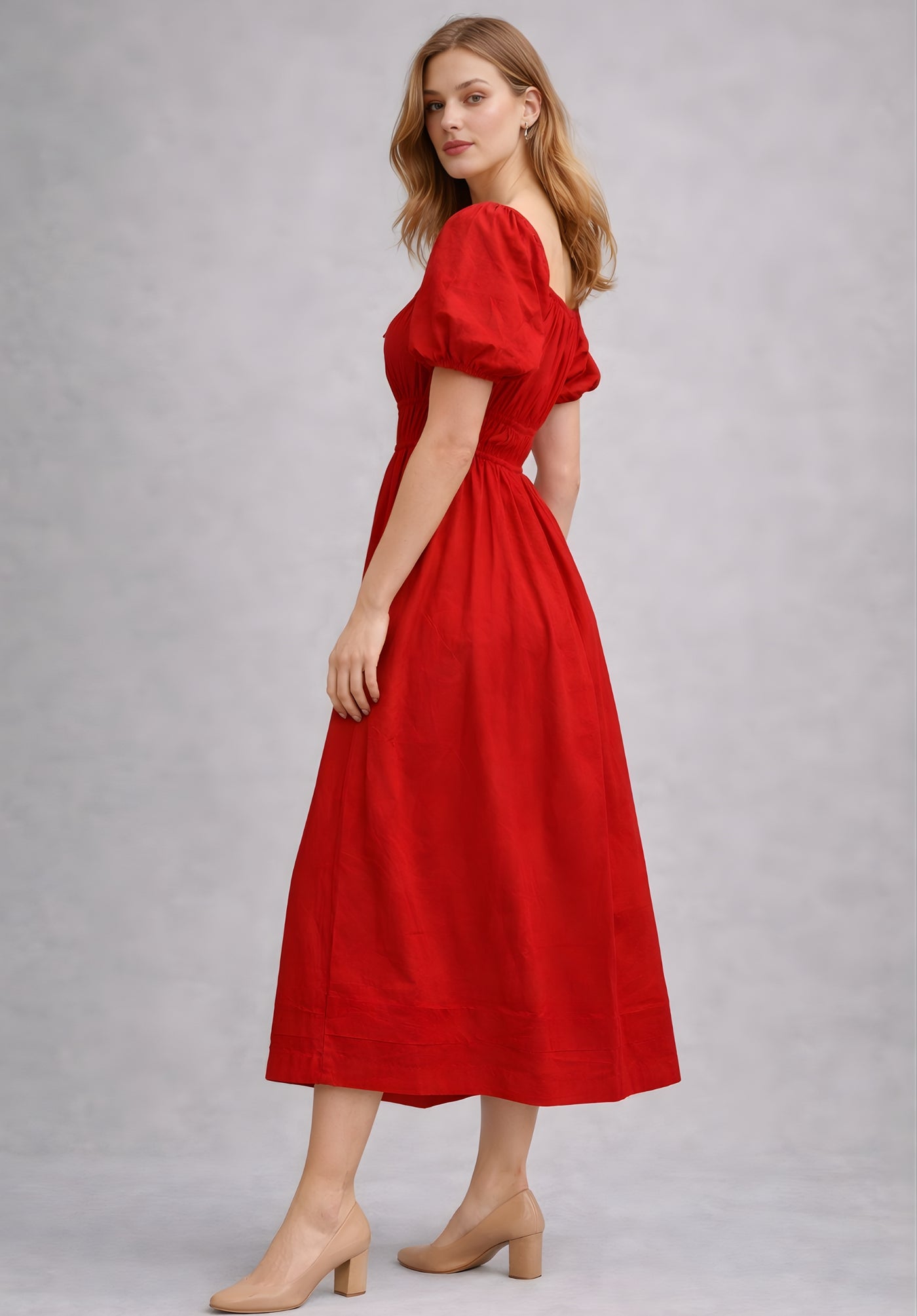 Close-up of smocked waistband on red pure cotton A-line dress