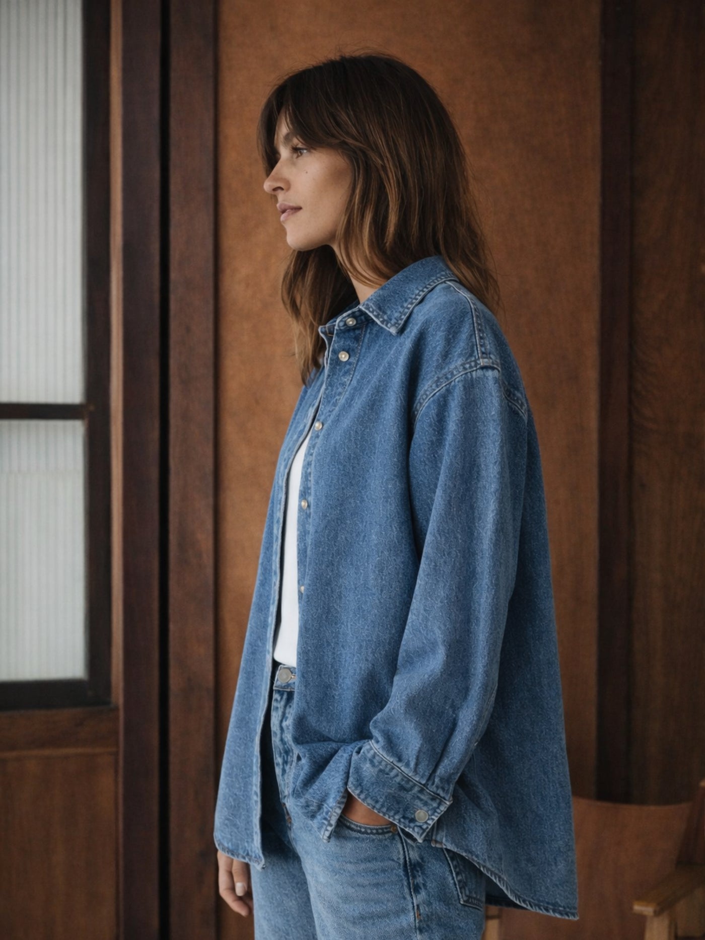 Close-up of spread collar on blue cotton denim shirt