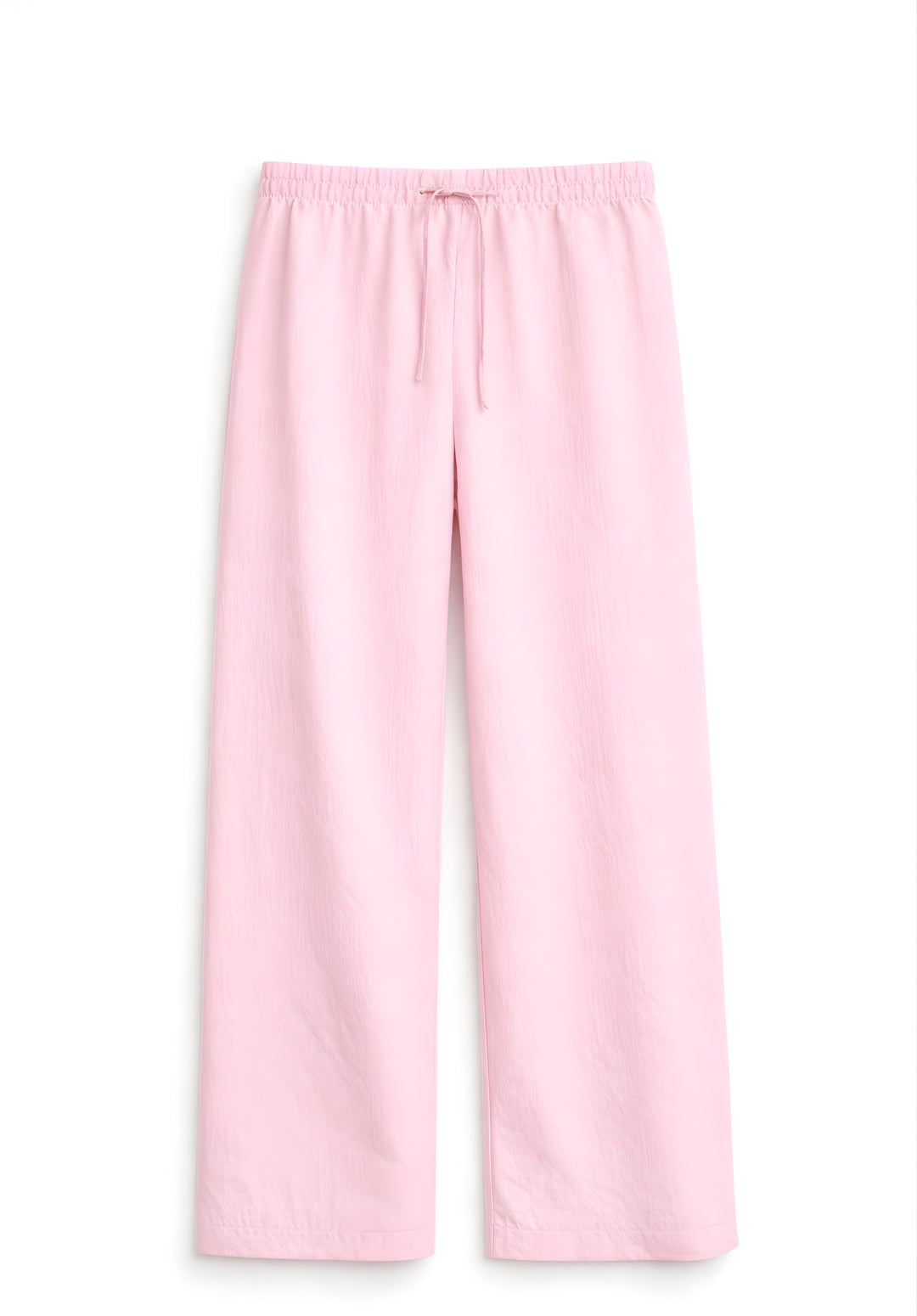Front view of light pink linen blend baggy trousers for women on model