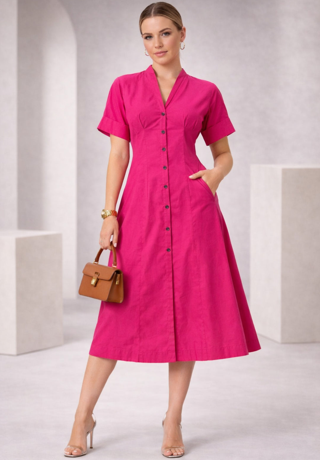 Front view of pink pure cotton A-line buttoned dress with collar