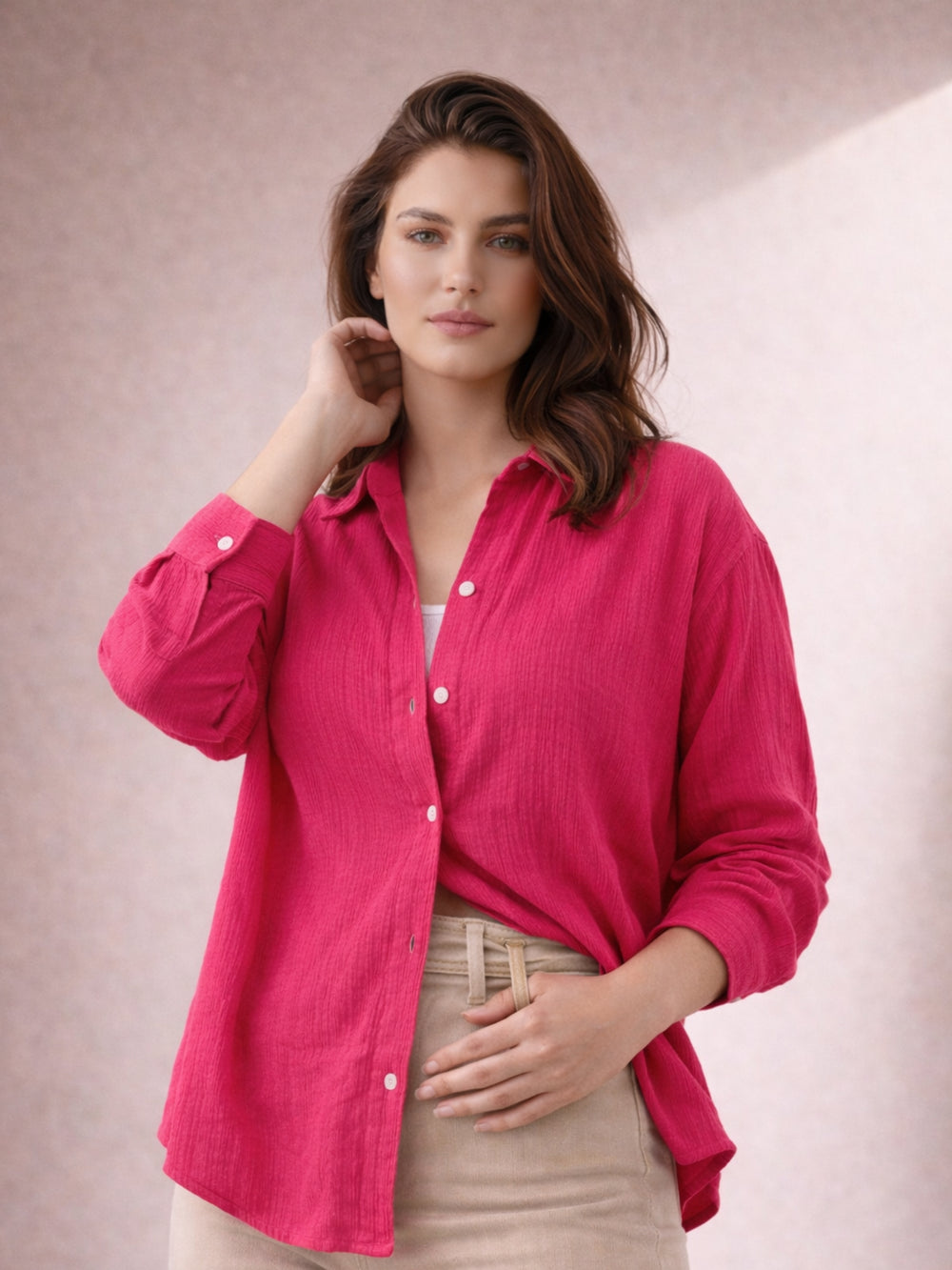 Side view of pink wrinkled cotton shirt with relaxed drape
