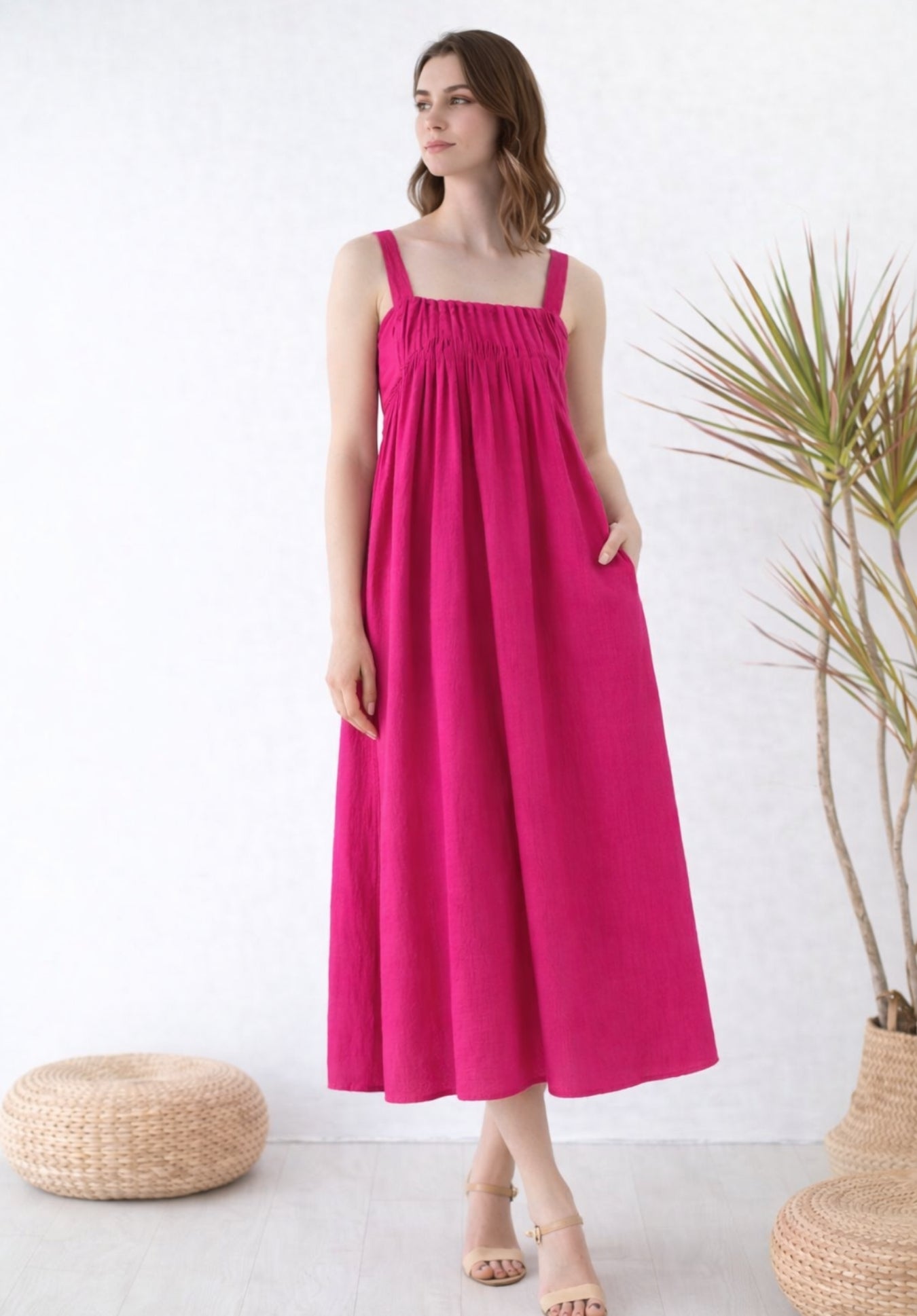 Pink pleated cotton A-line smoked waist midi dress styled view