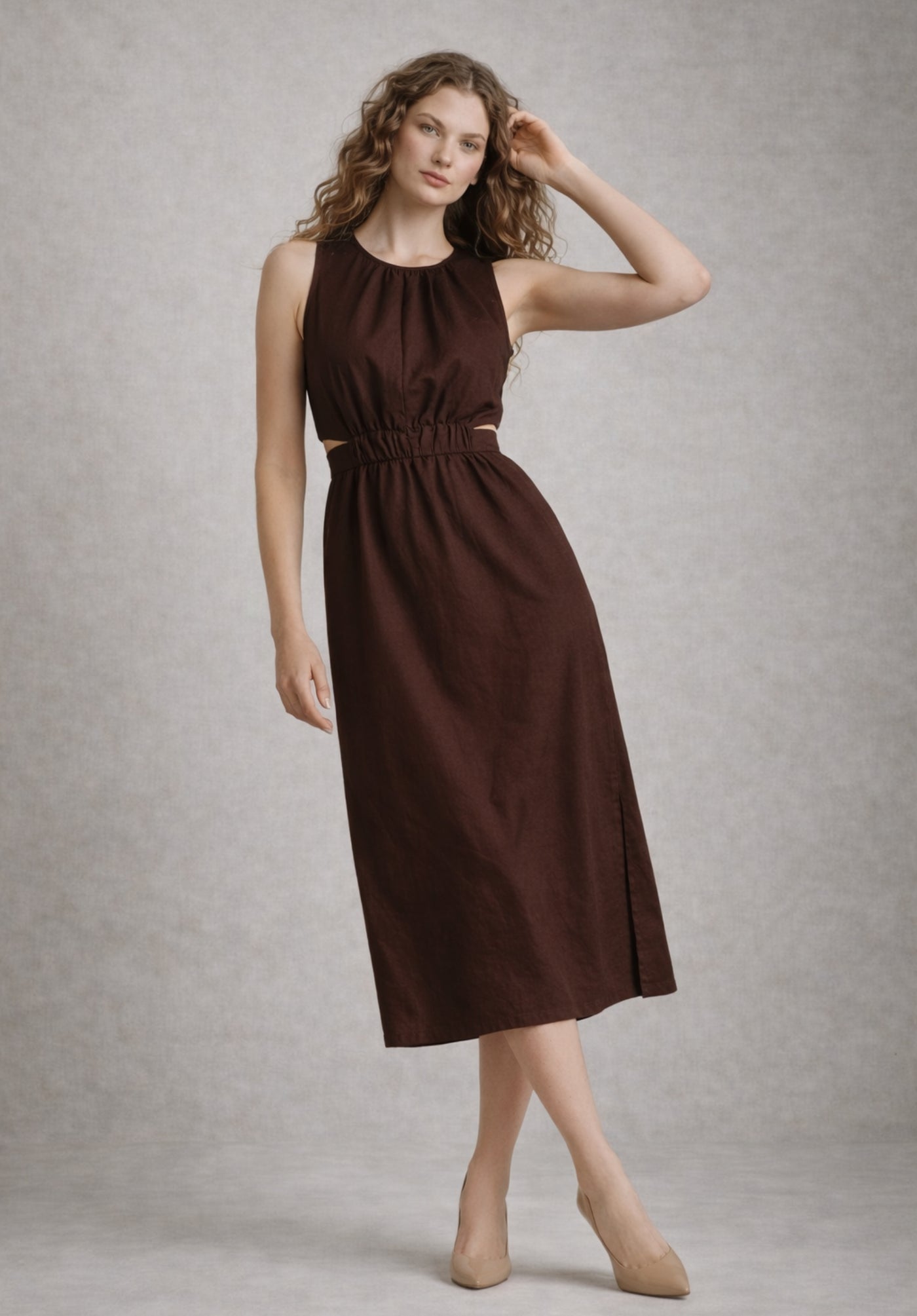Front view of brown pure cotton A-line dress with button-down front