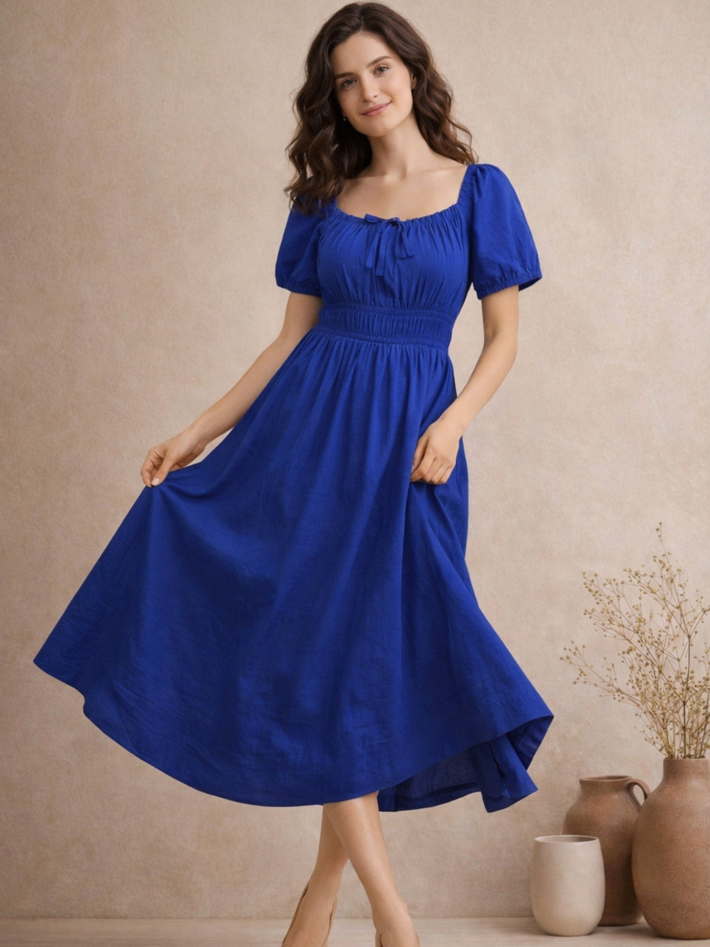 Front view of blue pure cotton A-line smoked waist midi dress