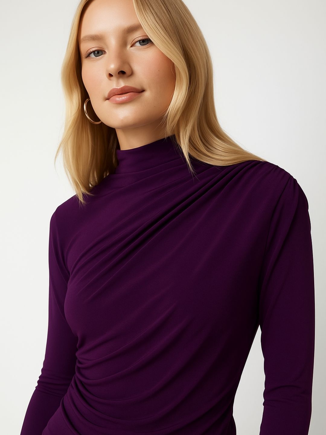 Front view of maroon high neck top with long sleeves