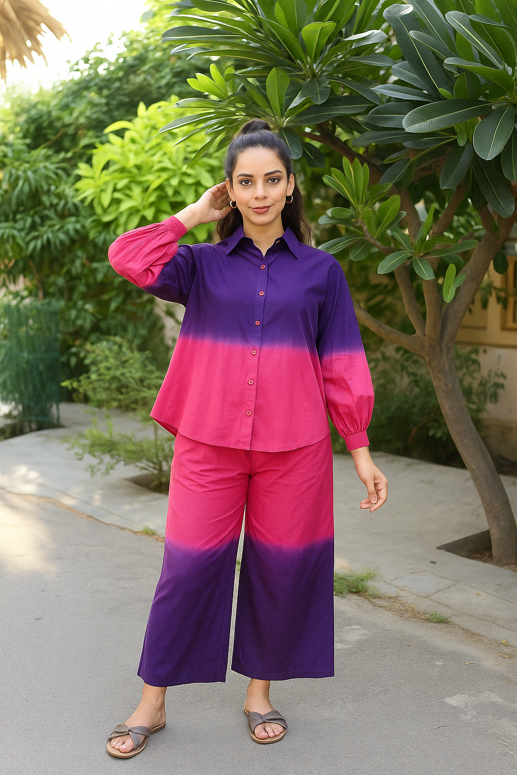 Front view of woman in purple and pink ombre tie-dye cotton co-ord set