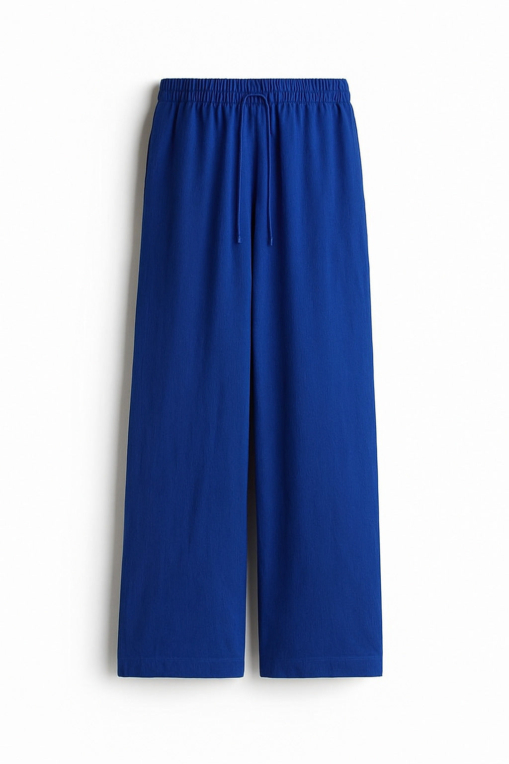 Front view of blue linen blend baggy trousers for women