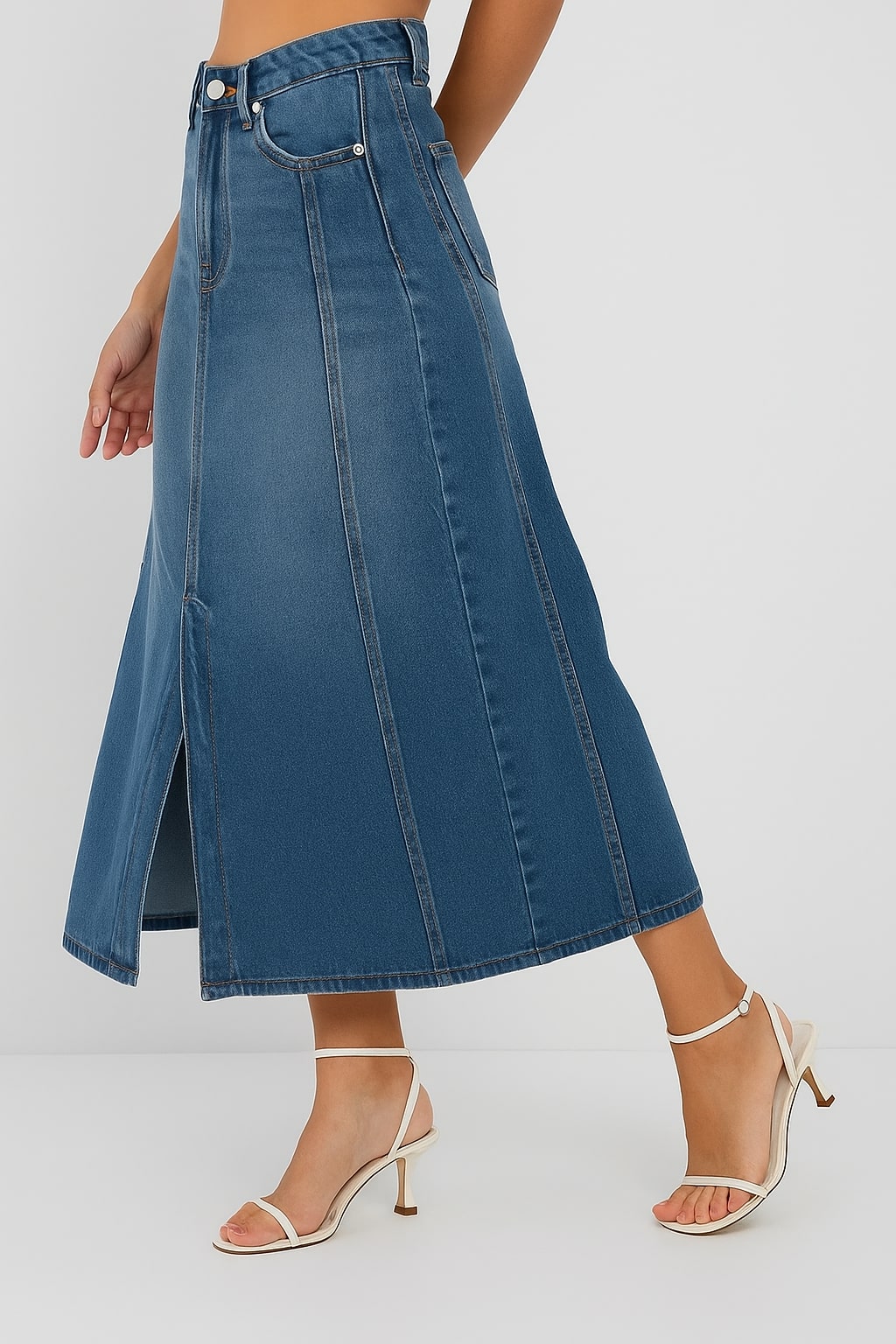 Side view of blue denim skirt on model