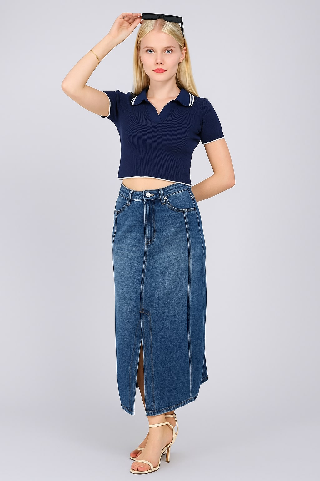 Lifestyle styling of blue denim skirt with cropped sweater