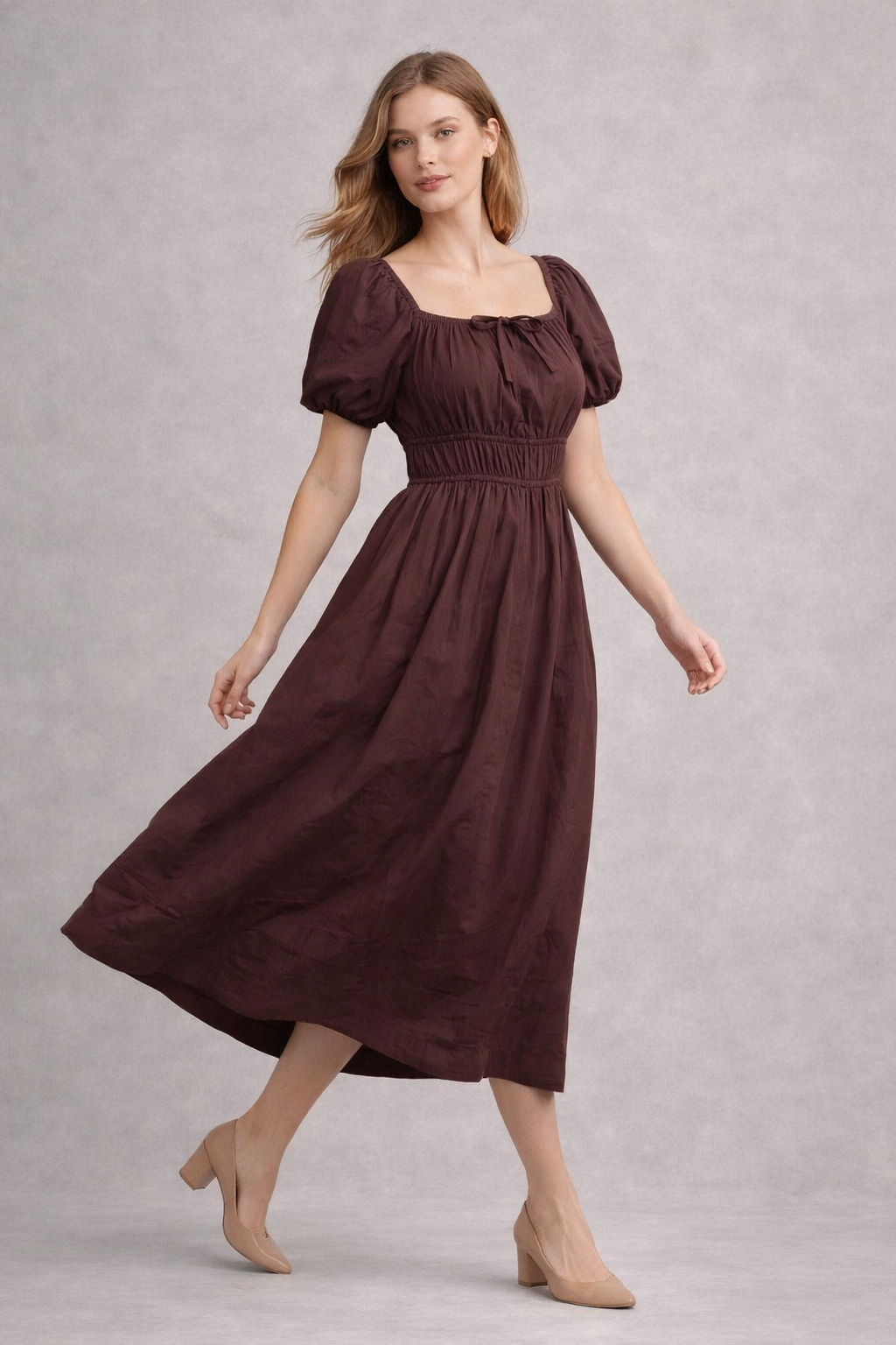 Lifestyle shot of brown A-line cotton dress