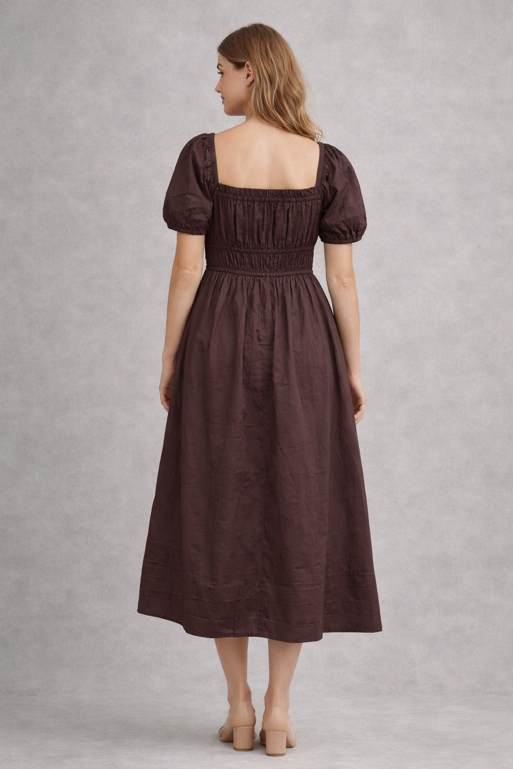 Back view of brown cotton smocked waist dress
