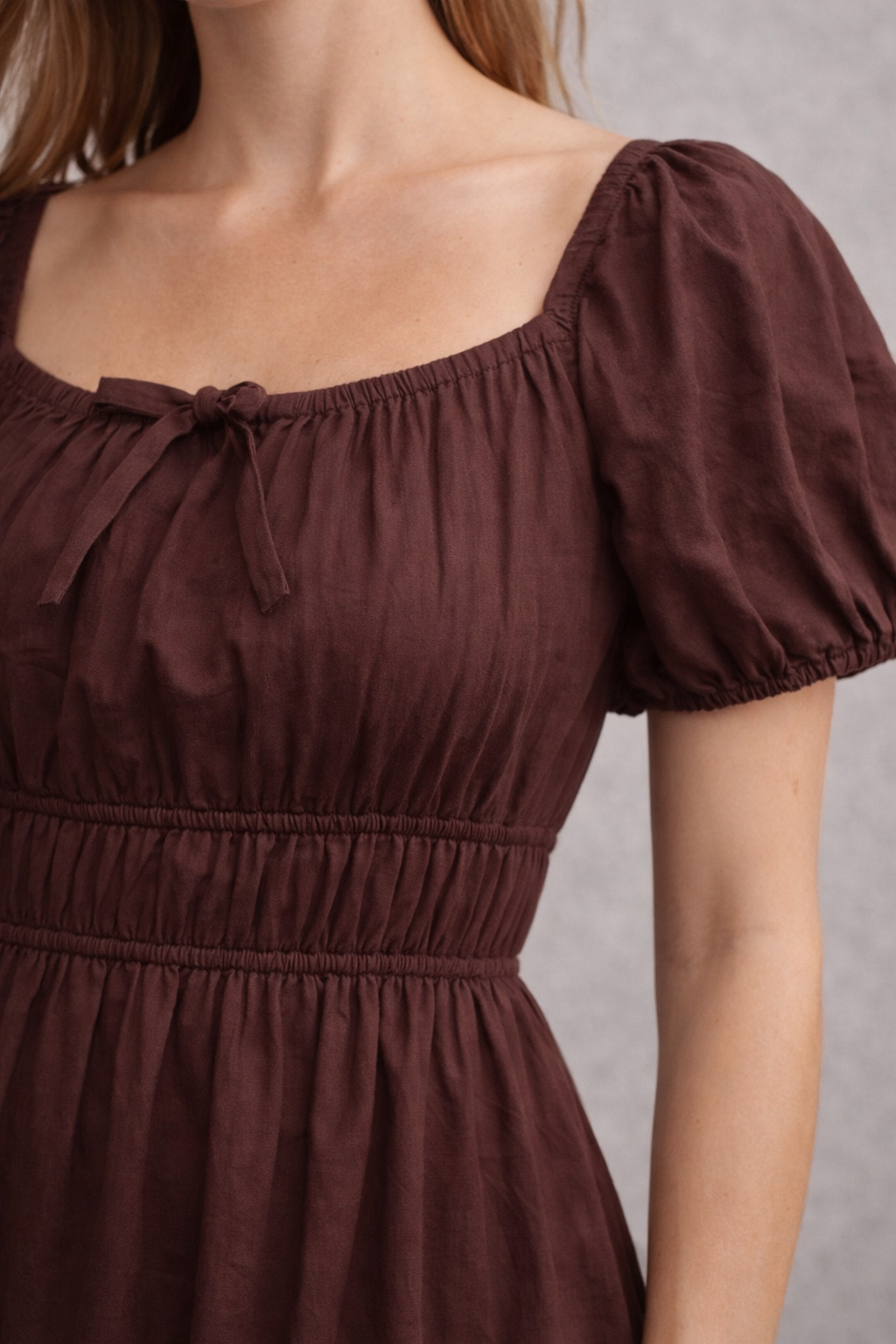 Side view of brown cotton A-line dress
