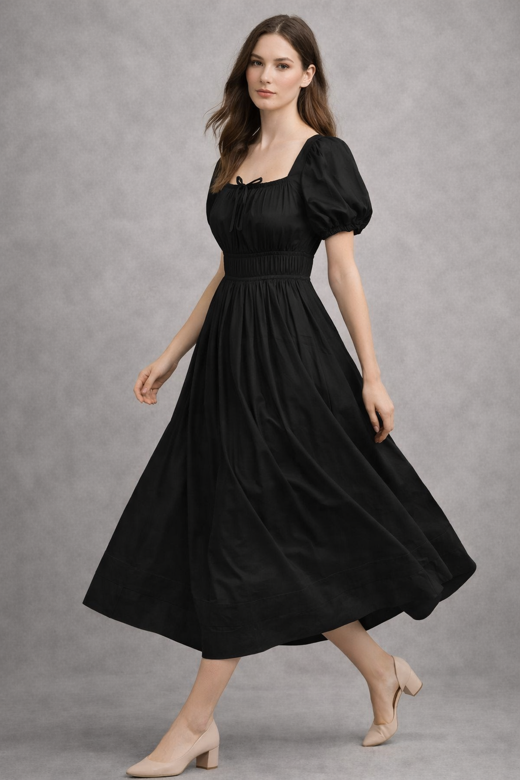 Lifestyle shot of black cotton midi dress