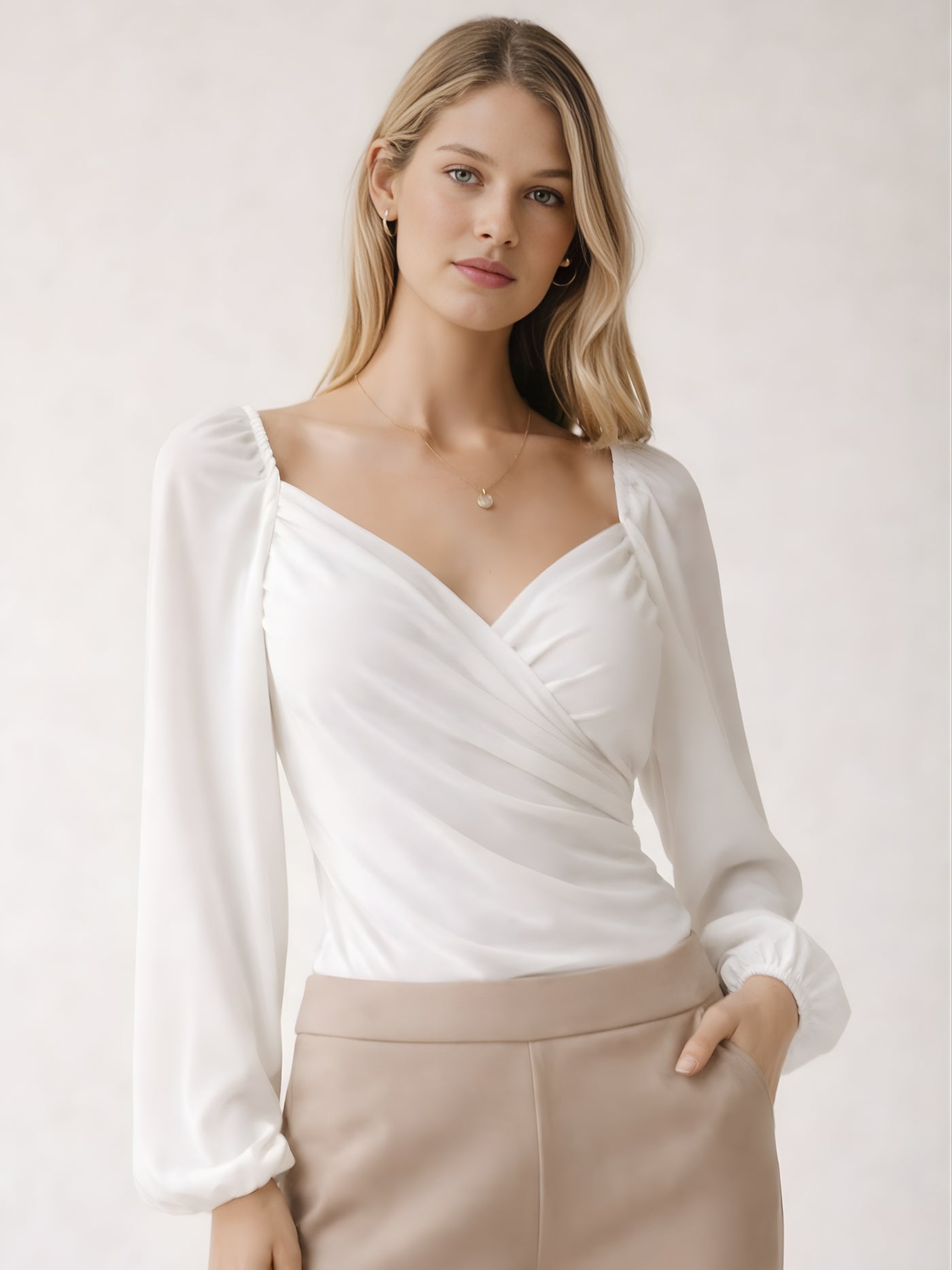 Close-up of white wrap top fabric and stitching