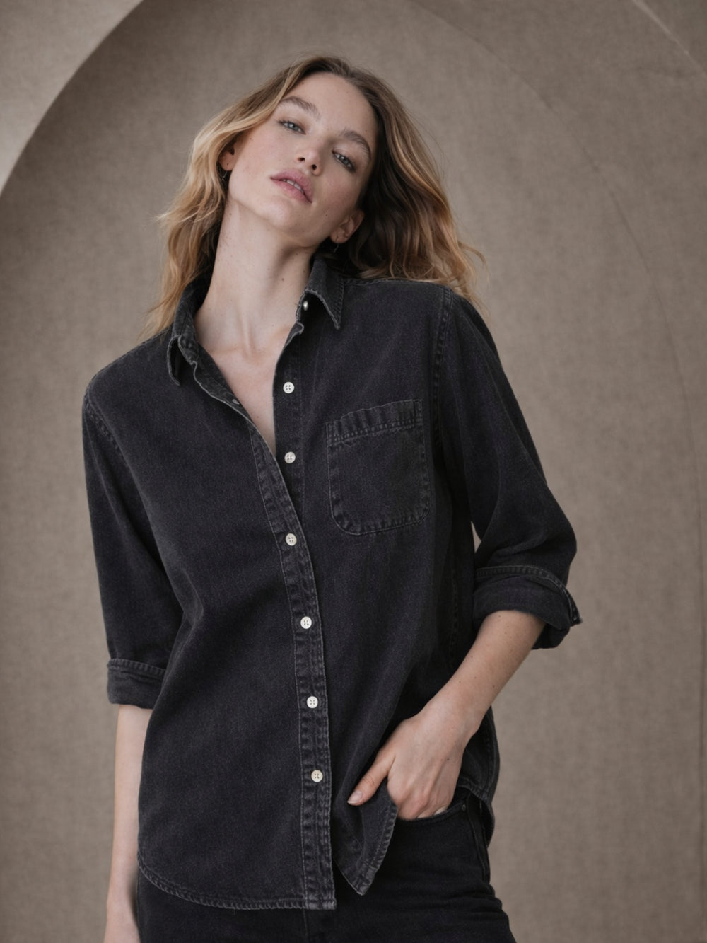 Side view of black oversized denim shirt
