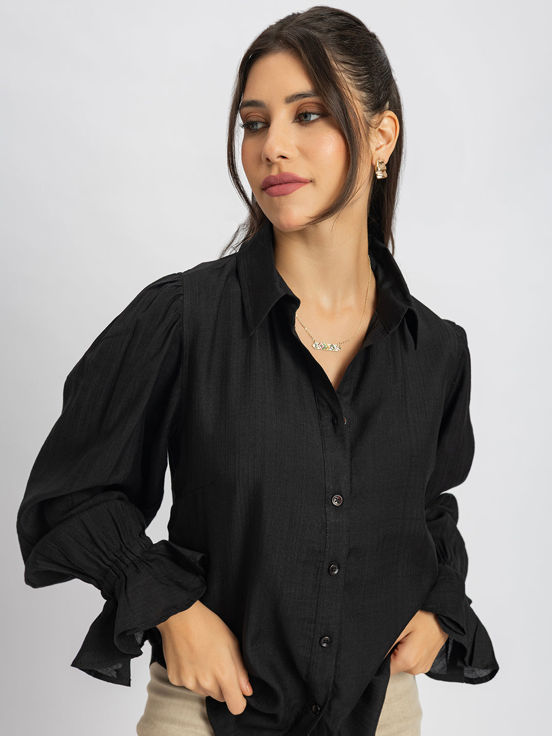 Black ruffled cuff shirt front view for women