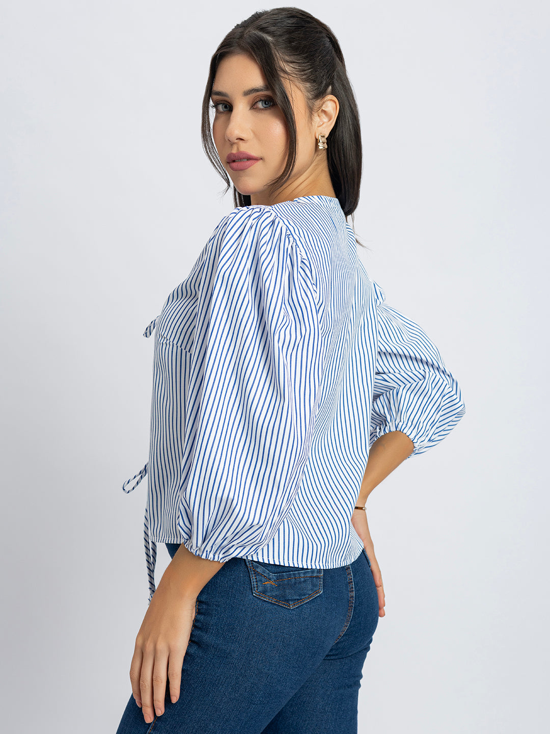 Back view of white and blue stripes string top