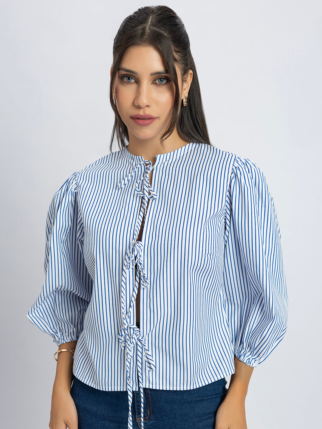 Front view of white and blue stripes string top for women