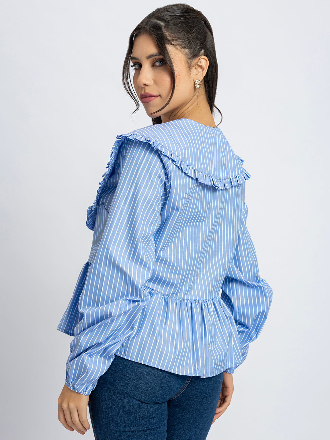Close-up of frill collar detail on striped peplum top